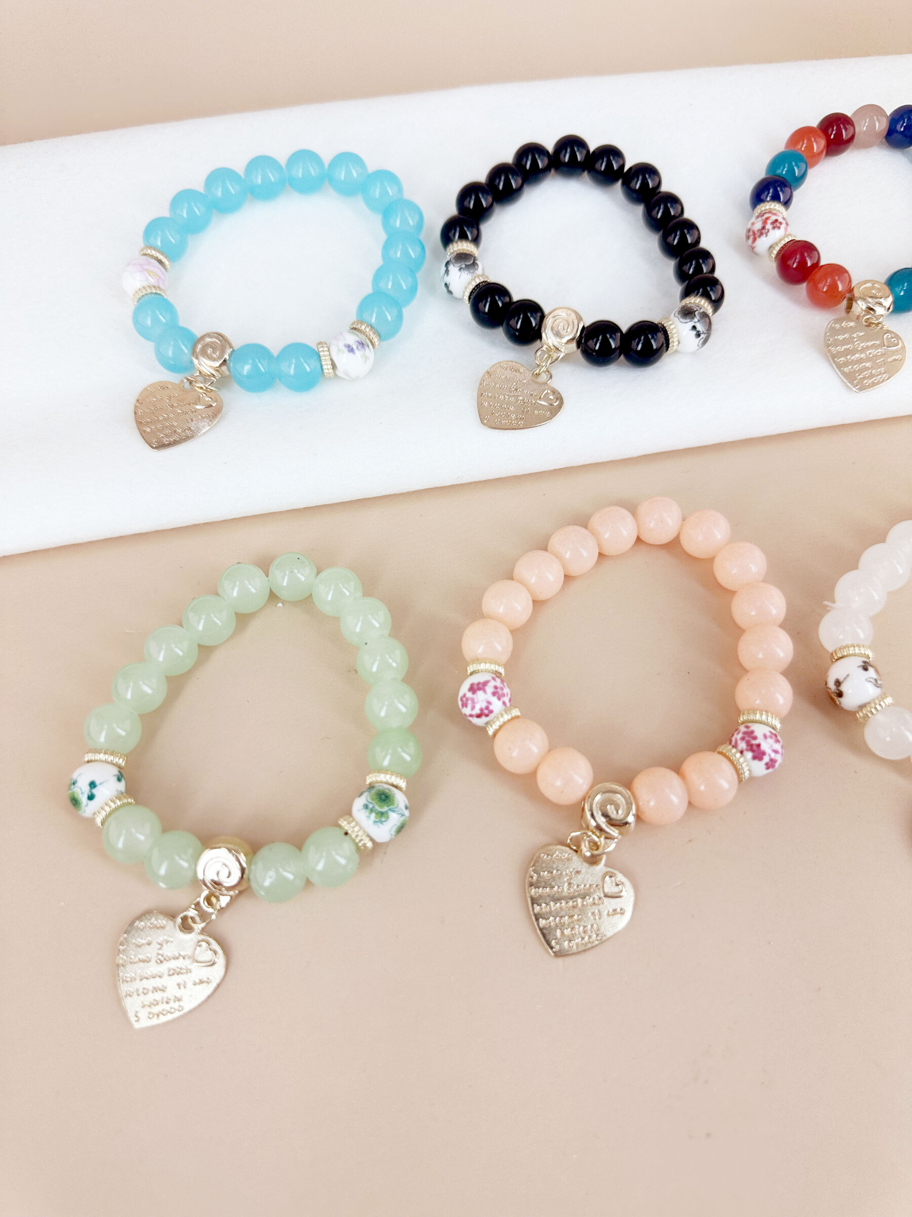 Grossista D Bijoux - 12 braccialetti con ciondolo