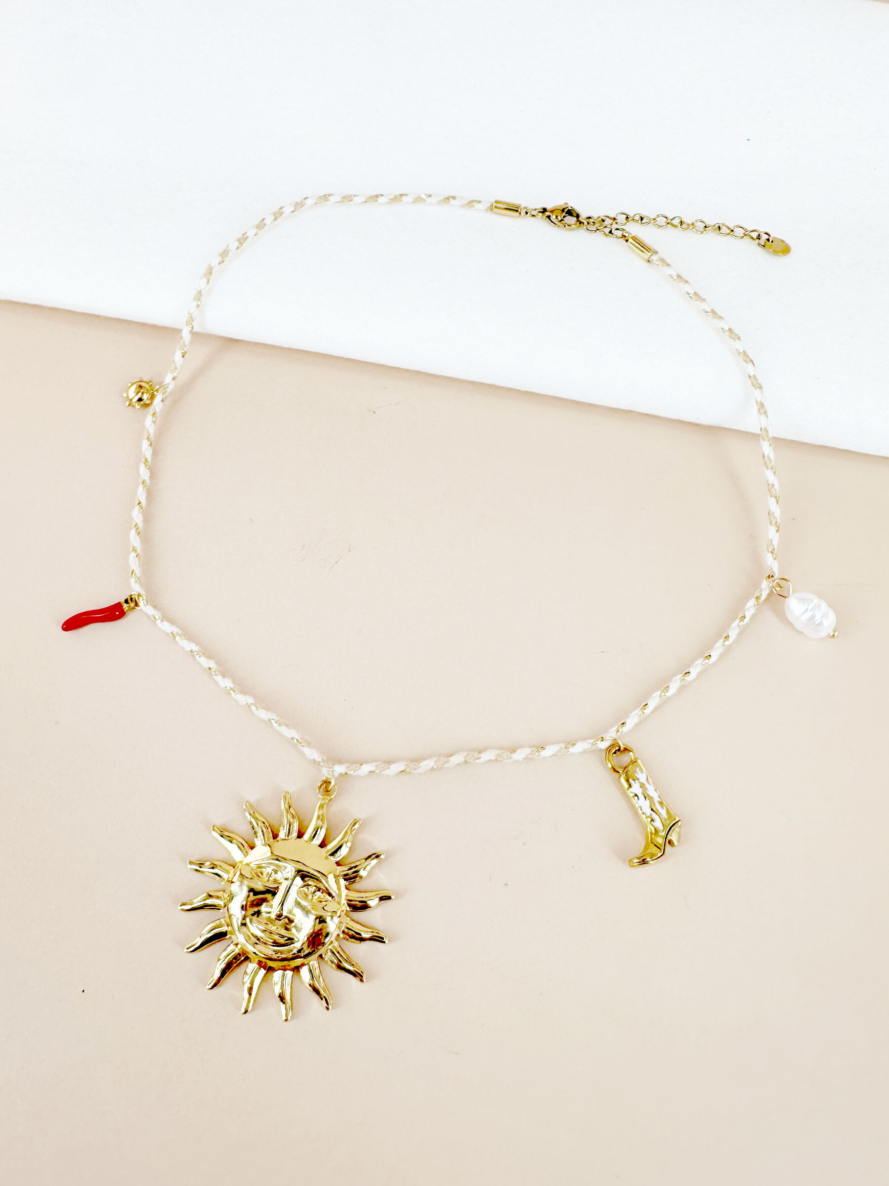 Grossiste D Bijoux - Collier cordon avec charms soleil en acier inoxydable