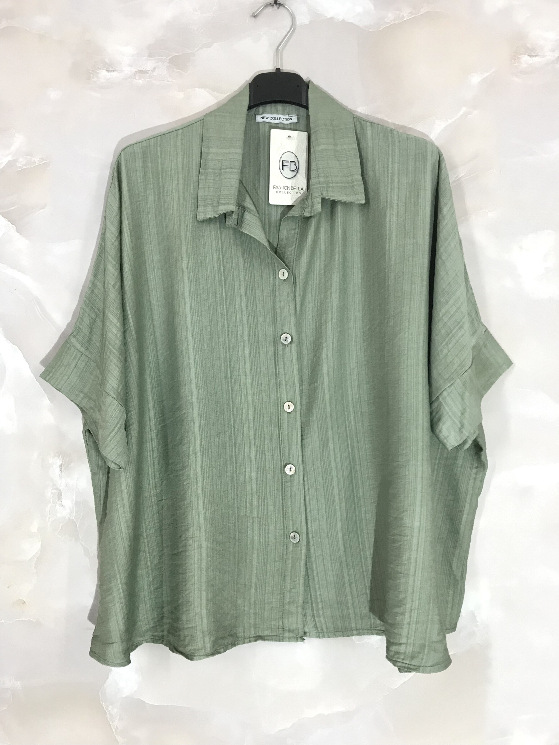 Grossiste D&L CREATION - Chemise courte unie texturée grande taille aux manches courtes T38 à T54+