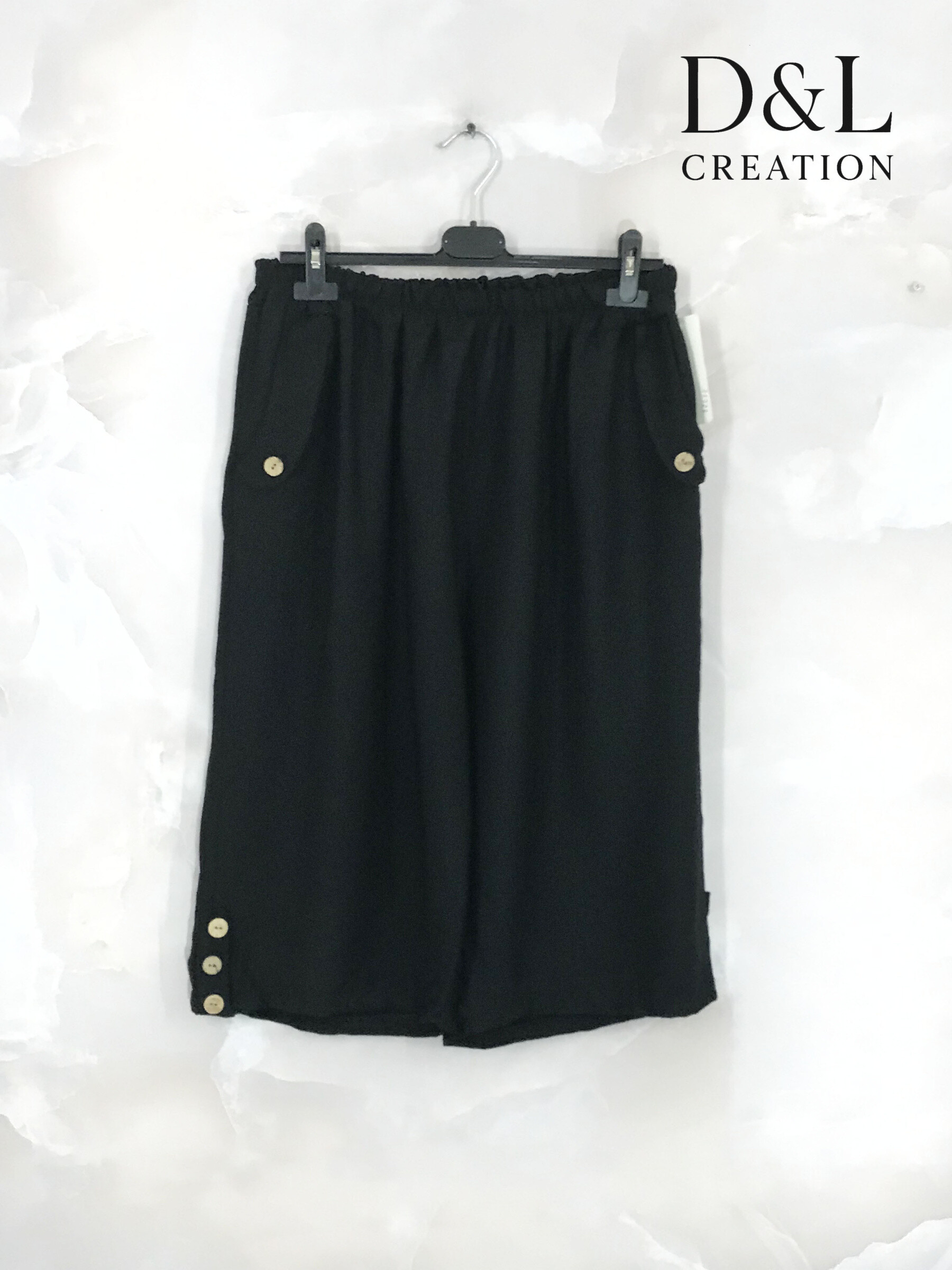 Mayorista D&L CREATION - Pantalones cortos fluidos con botones de madera talla 38 a 50