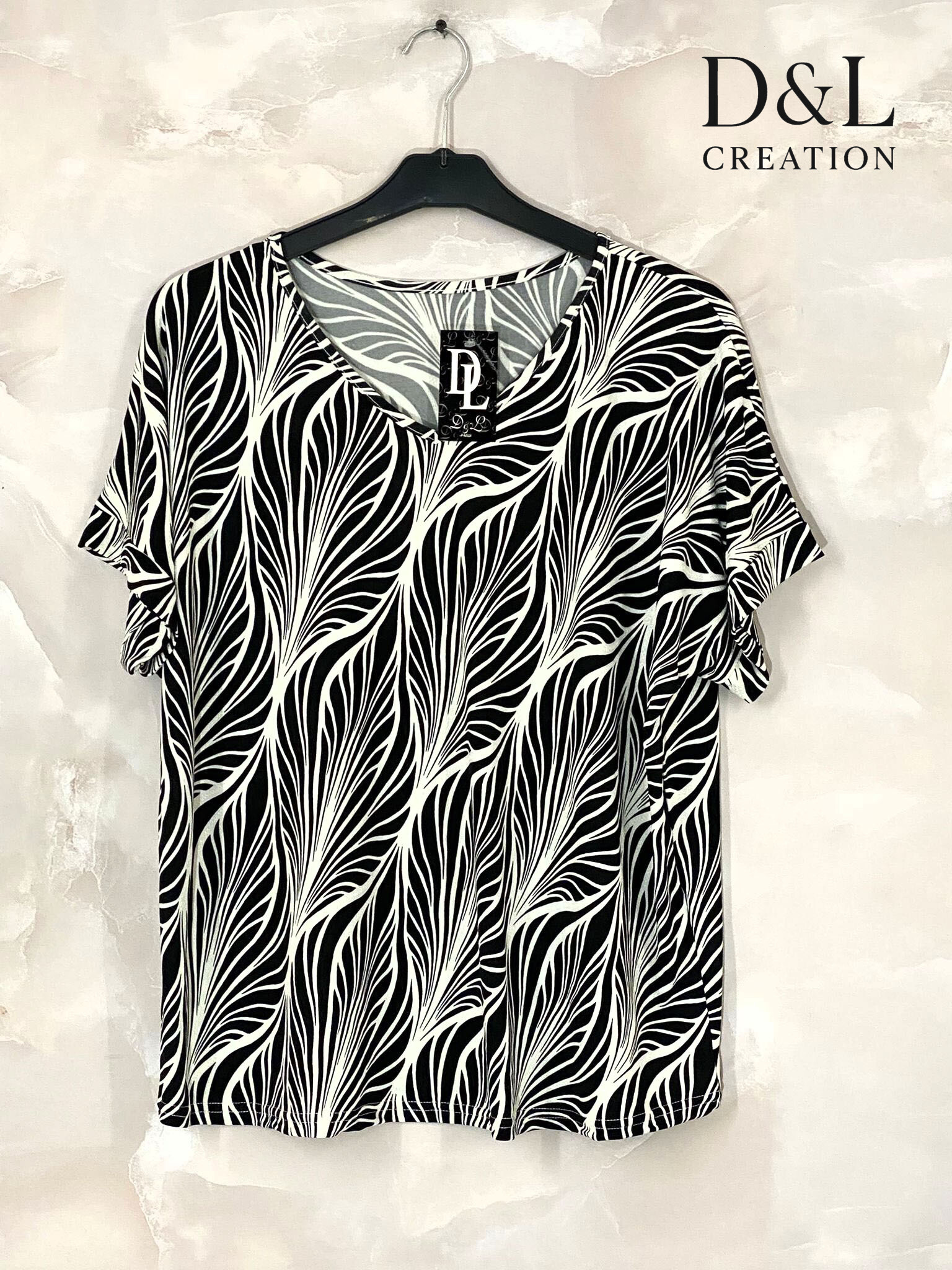 Wholesaler D&L CREATION - V-neck top printed in crystal sizes 38 to 48