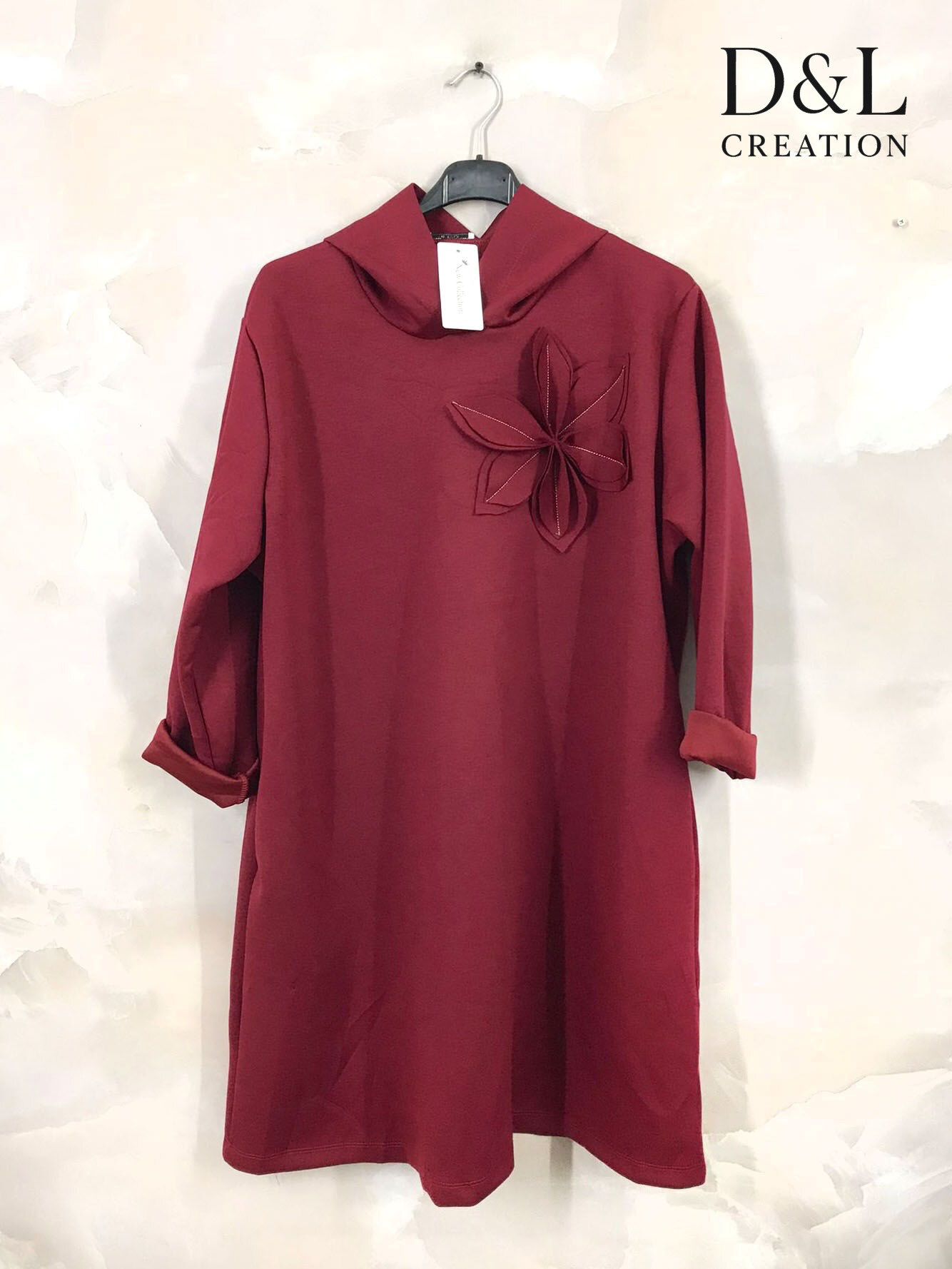 Mayorista D&L CREATION - Túnica suave con capucha y diseño floral, tallas 38 a 50