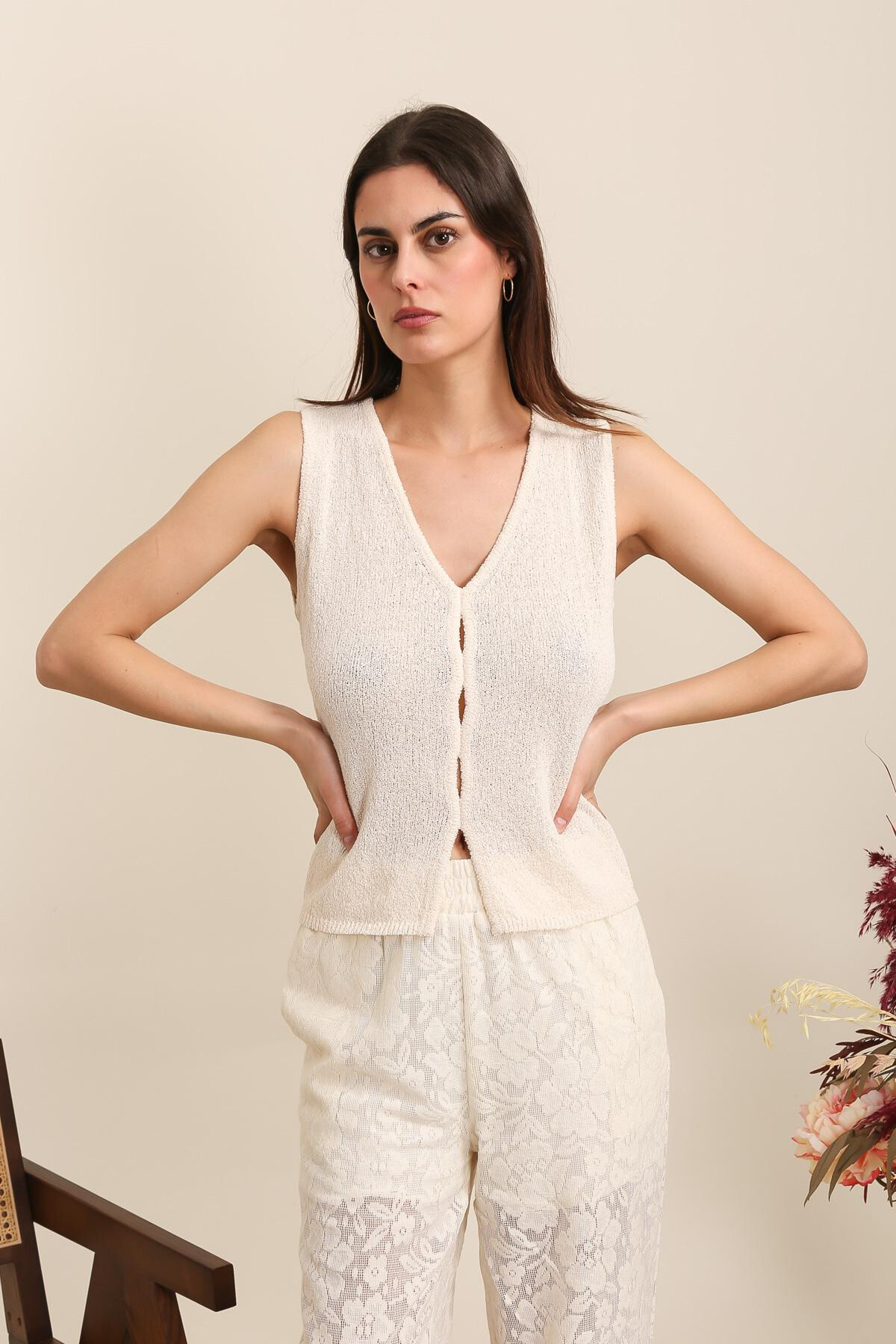 Grossiste DAPHNEA - Pull sans manches