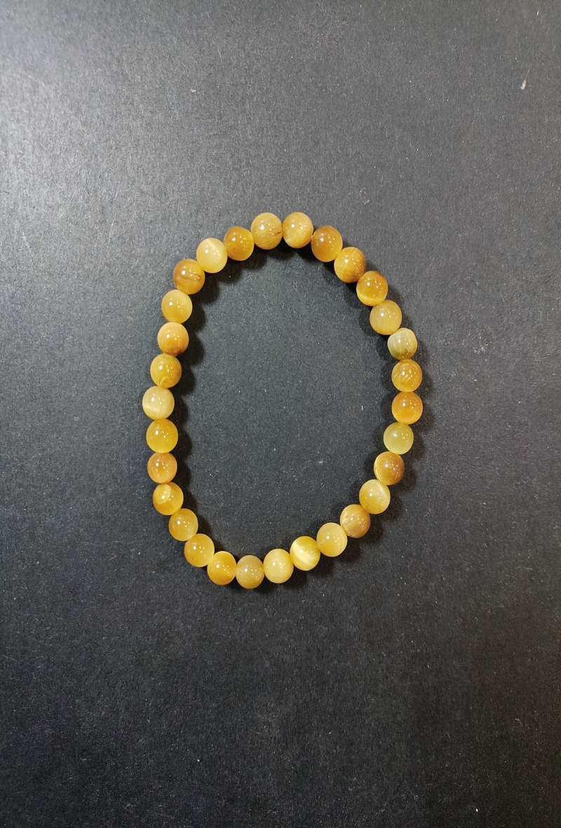 Grossiste Diamond - BRACELET OEIL DE TIGRE DOREE