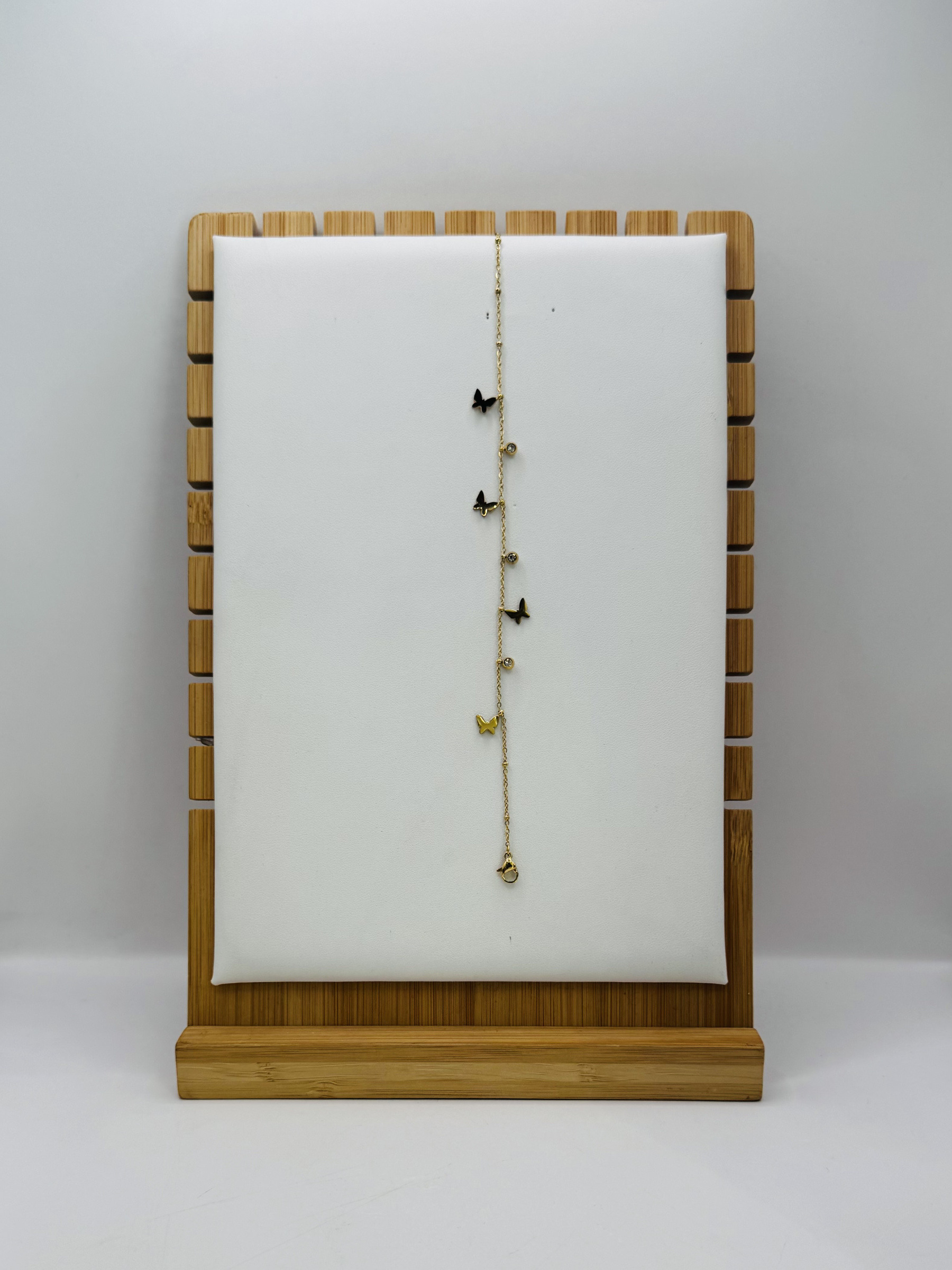 Mayorista Diamond - Tobillera de acero con mariposa y strass