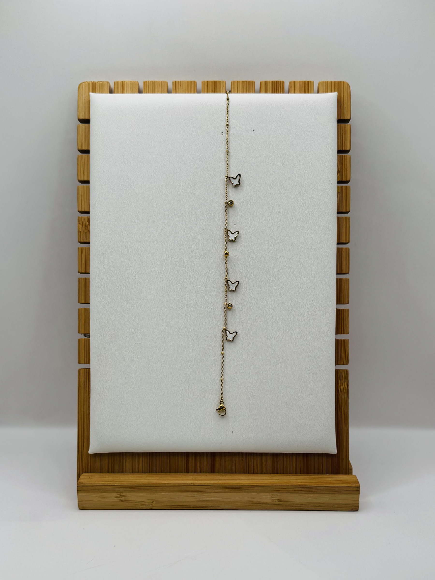 Mayorista Diamond - Tobillera de acero con mariposa y strass