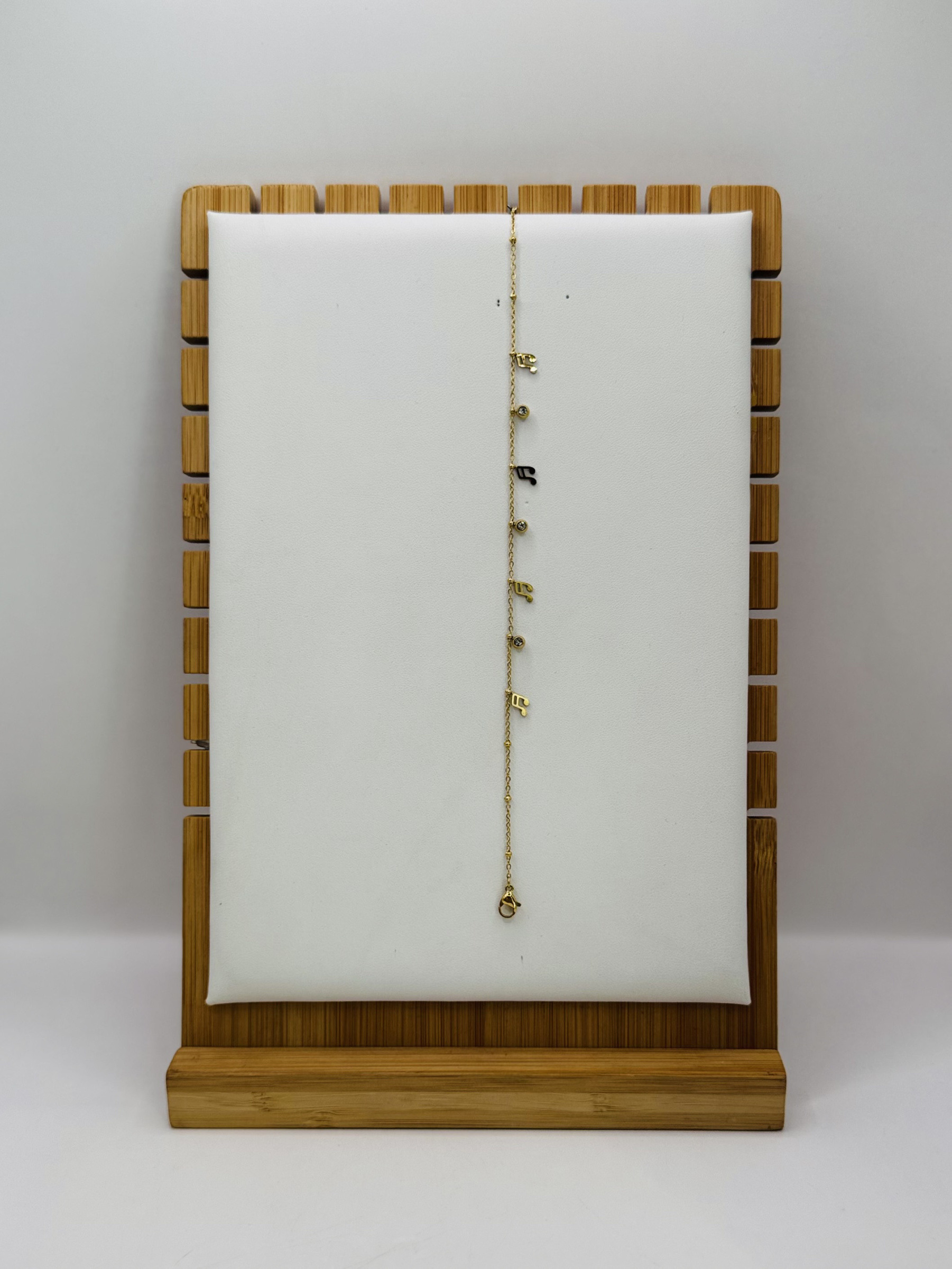 Mayorista Diamond - Tobillera de acero con nota musical y strass