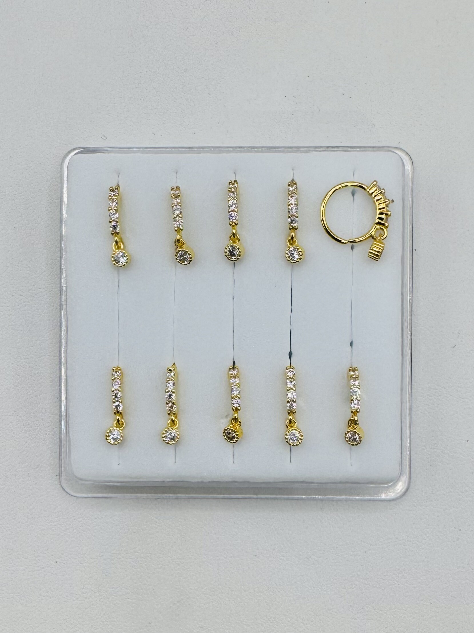 Großhändler Diamond - Nasenring-Piercing mit Strasslinie und rundem Anhänger