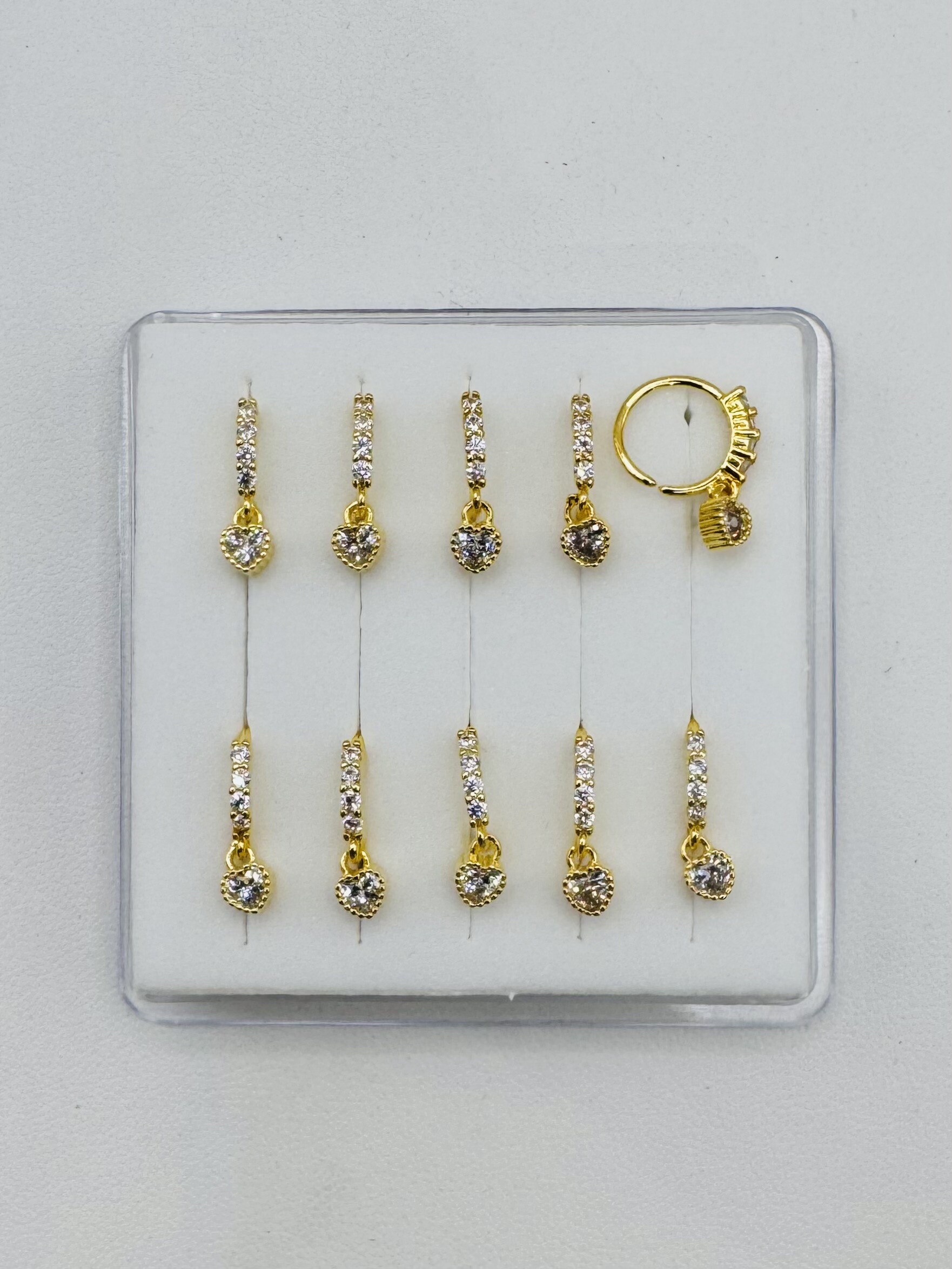 Großhändler Diamond - Nasenring-Piercing mit Strasslinie und Herzanhänger