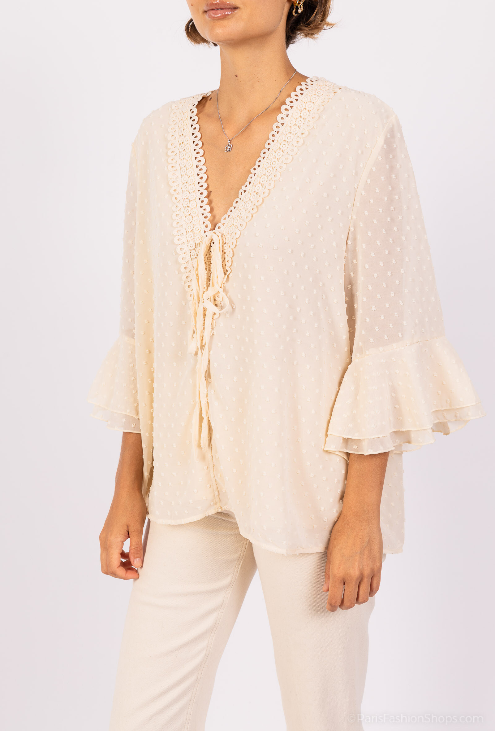 Großhändler DIVA TEX - Fließende und elegante Bluse