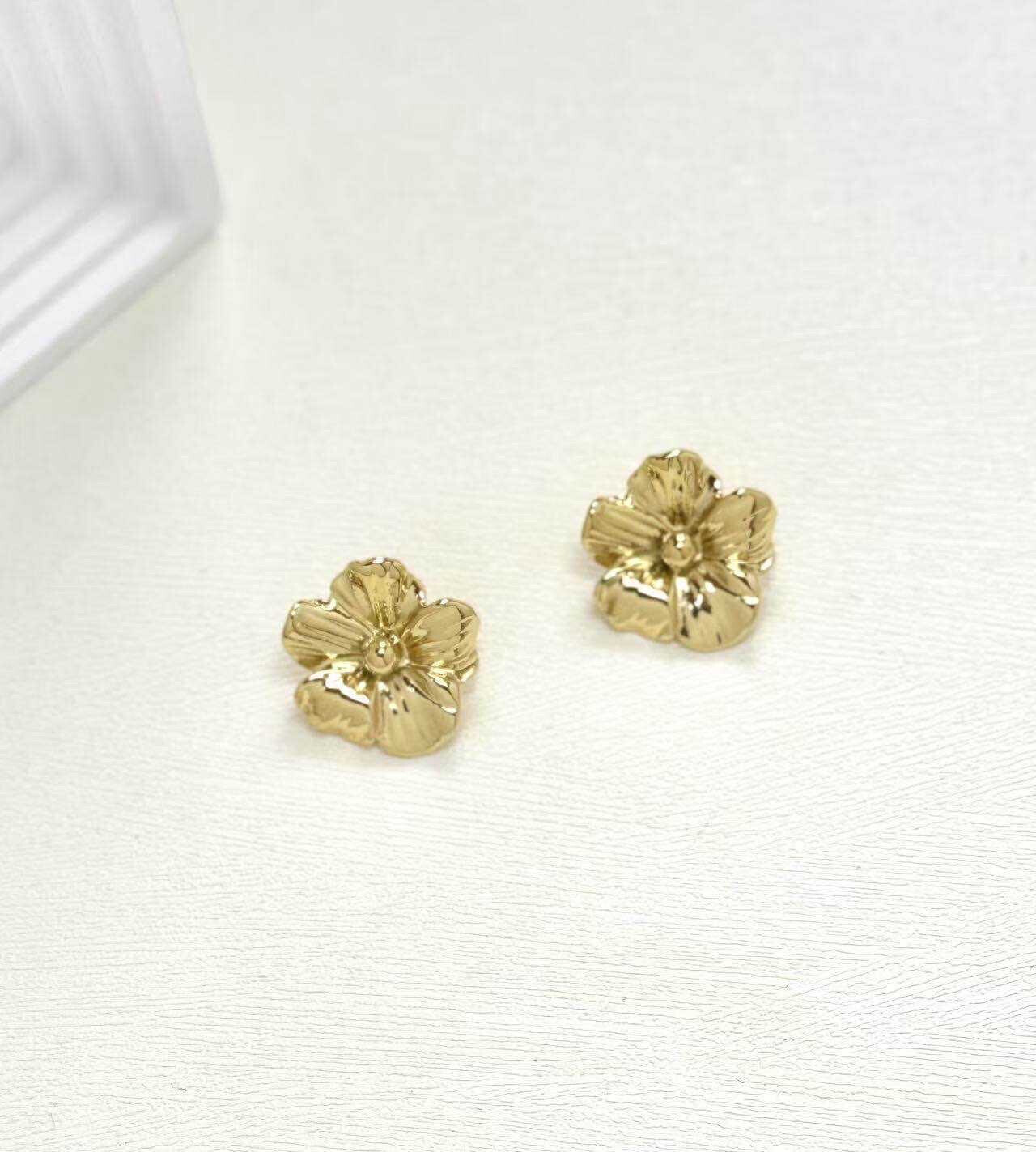 Grossiste Eclador Bijoux - Boucles d’oreilles en acier Inoxydable forme fleur