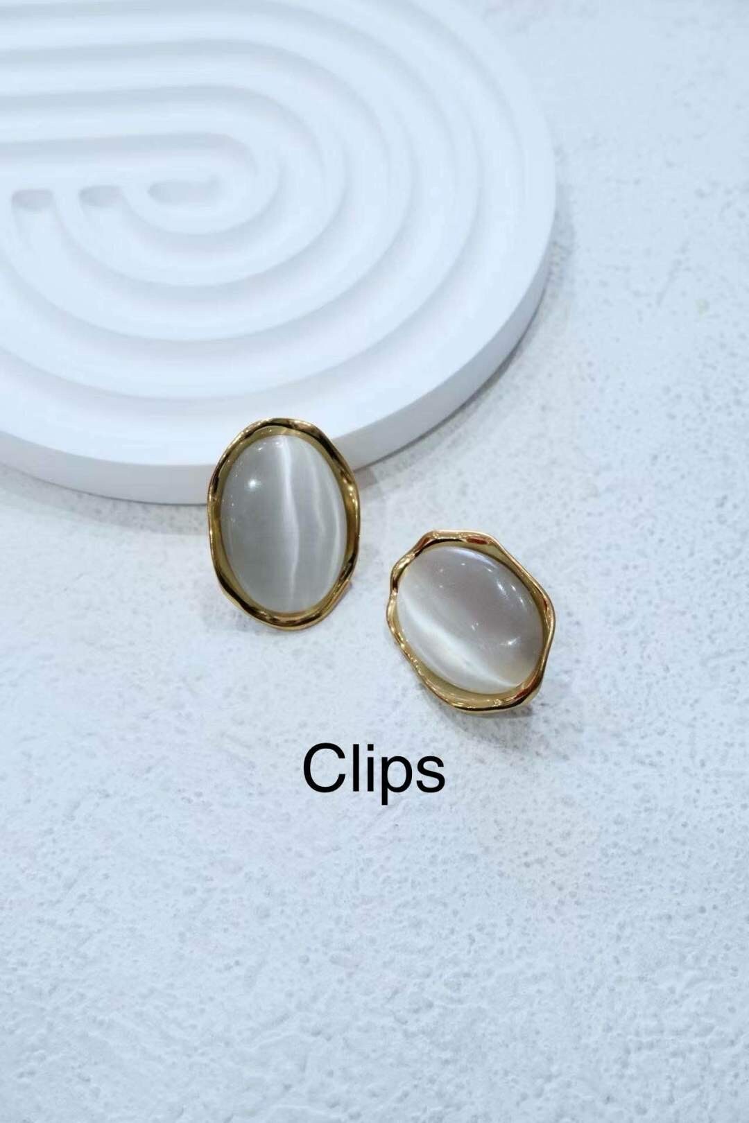 Großhändler Eclador Bijoux - Ohrmanschette in Edelstahl.  Frauenohrring