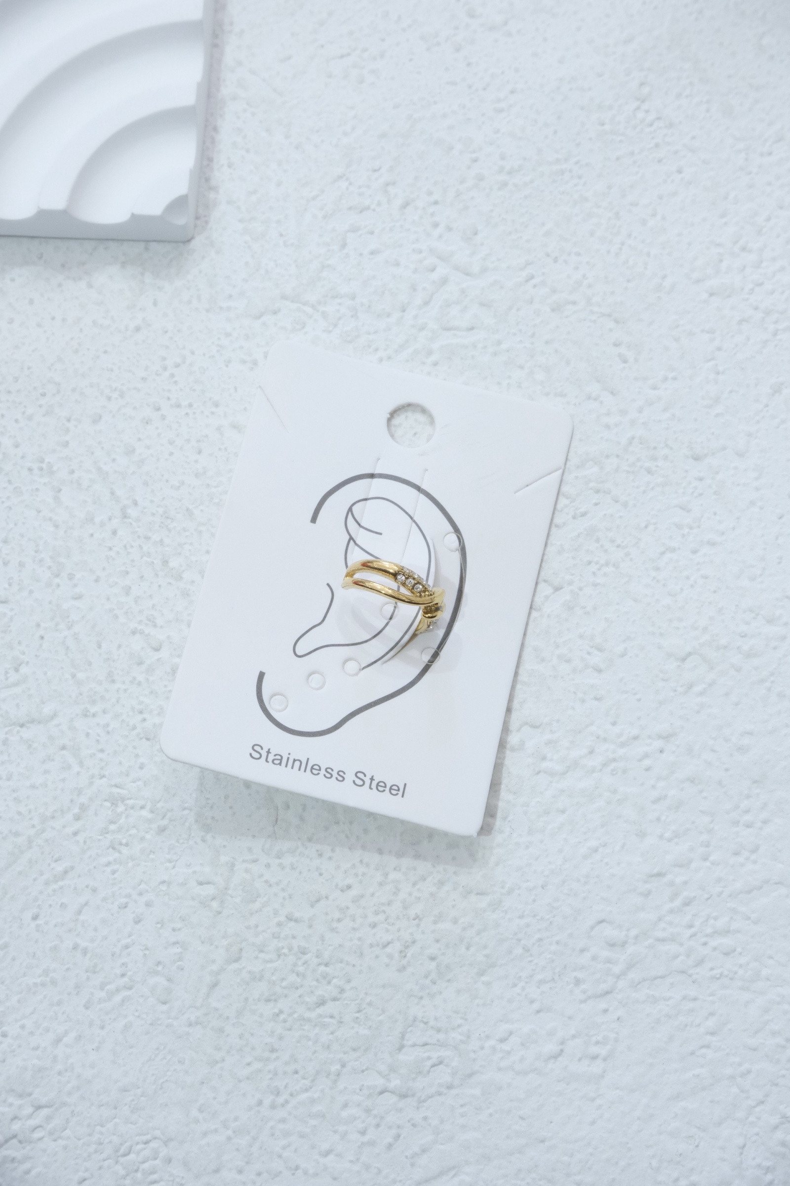Großhändler Eclador Bijoux - Ohrmanschette in Edelstahl.  Frauenohrring