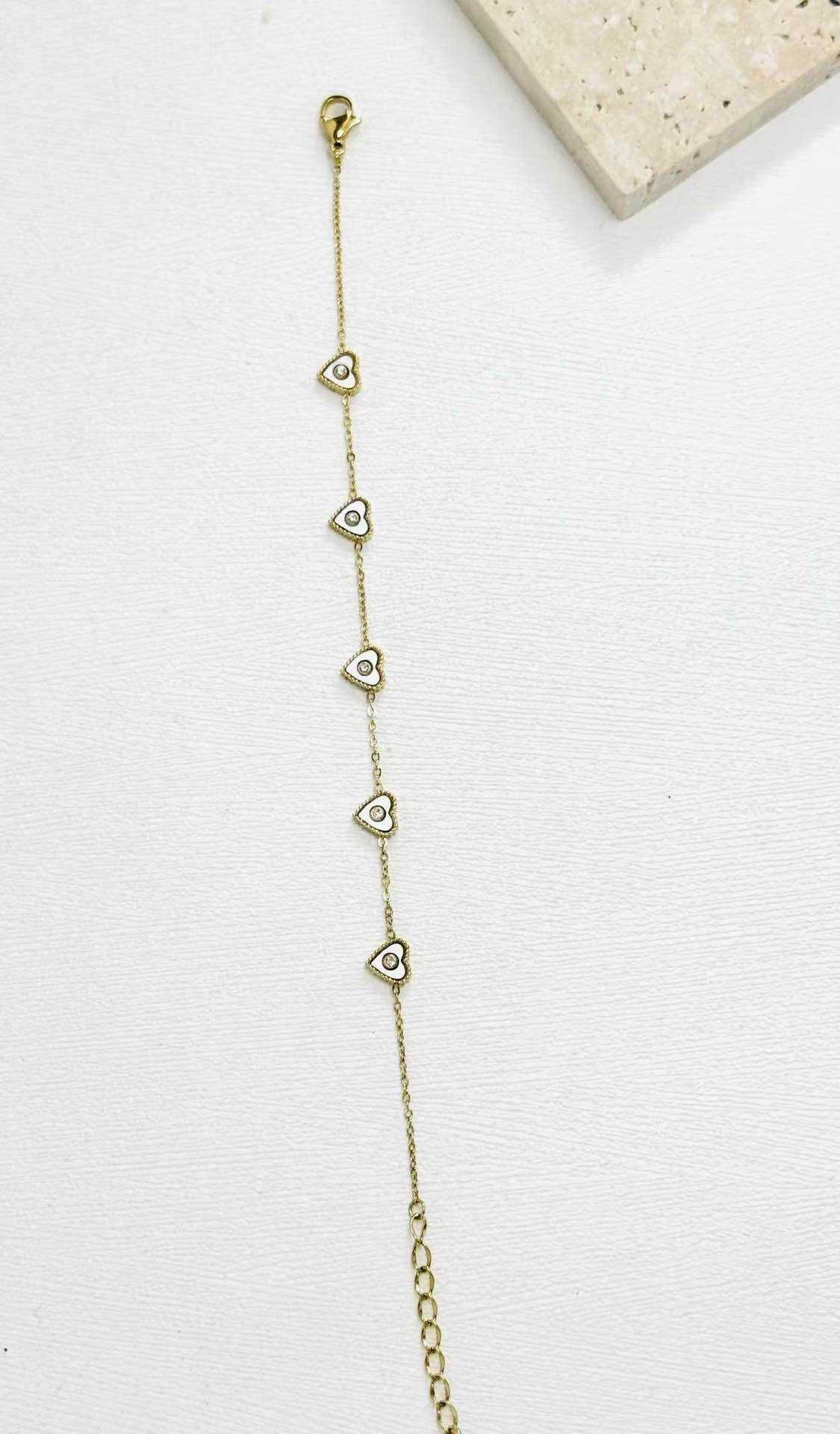 Grossista Eclador Bijoux - Bracciale in acciaio inossidabile, decorato con diversi piccoli pendenti circolari.