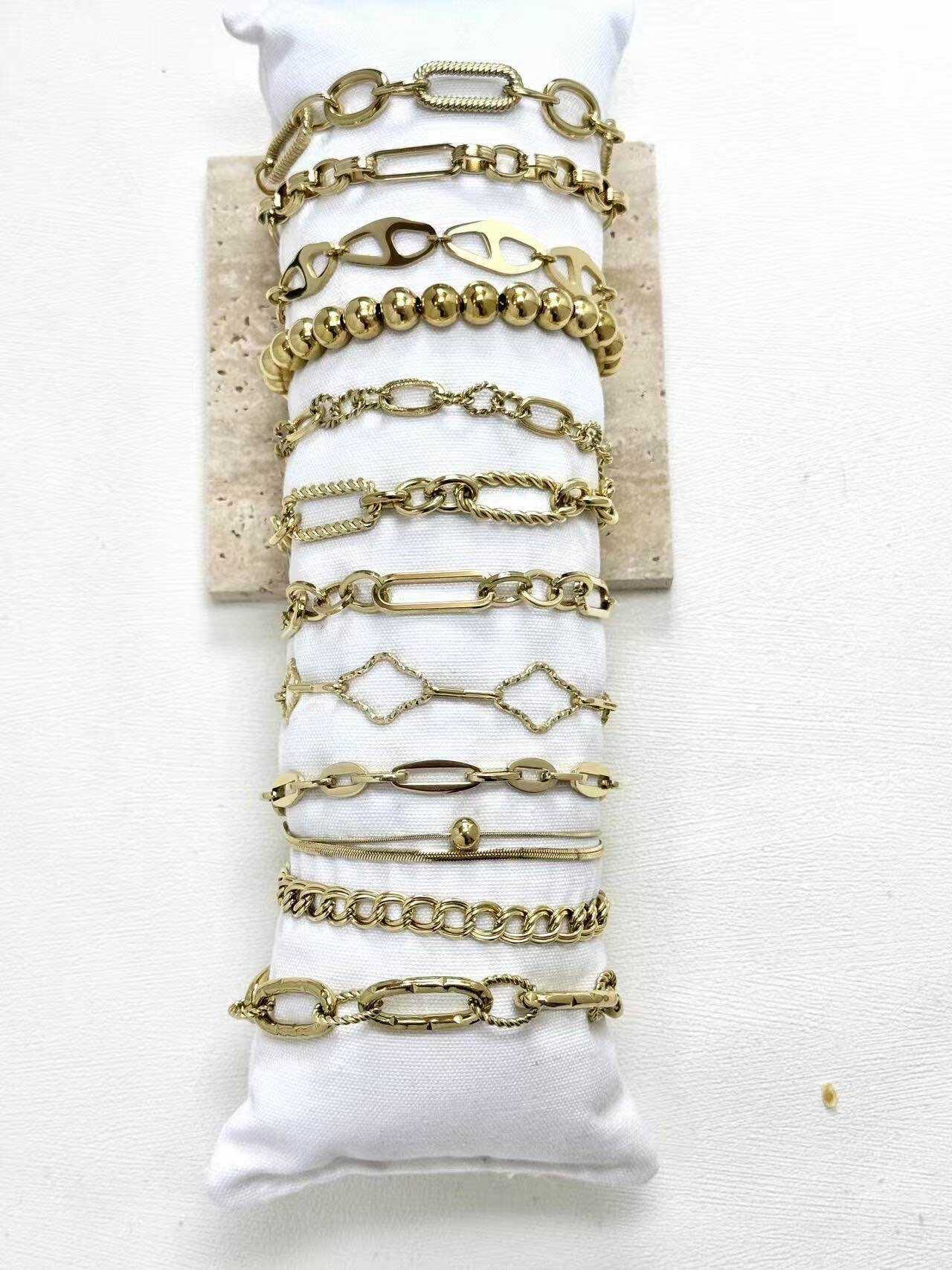 Grossiste Eclador Bijoux - Lot de 12 bracelets en acier Inoxydable.