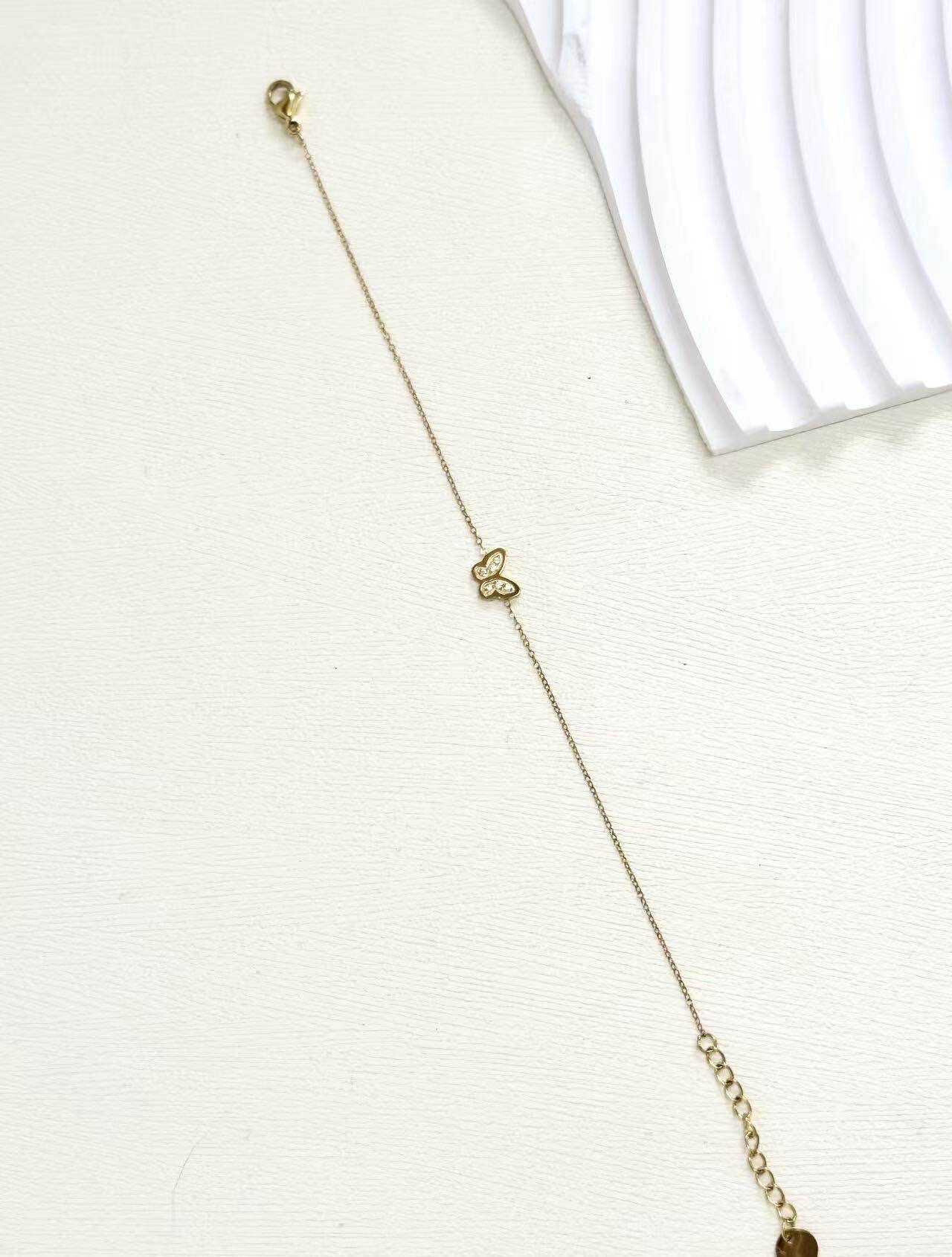 Grossiste Eclador Bijoux - Bracelet en acier Inoxydable avec papillon en pendentif