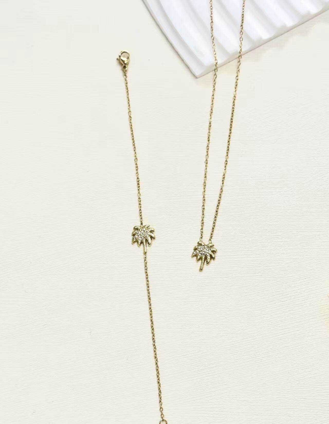 Grossiste Eclador Bijoux - Ensemble parure femme en acier inoxydable avec palmier en pendentif