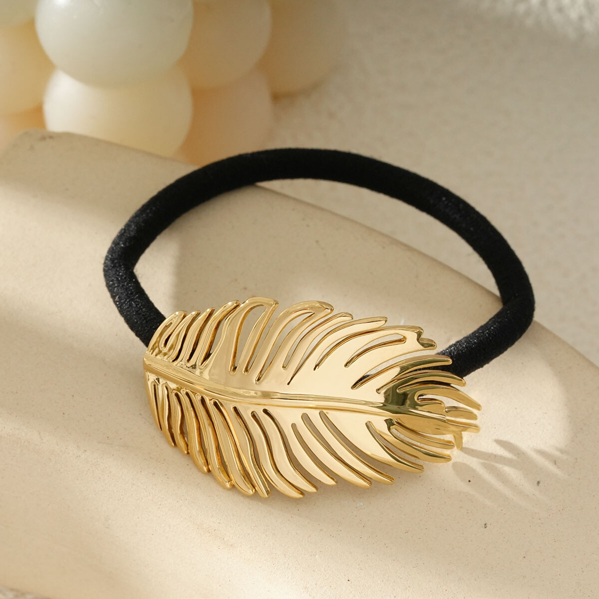 Grossista Eclat Paris - Elastic Chic raffinata foglia d'oro