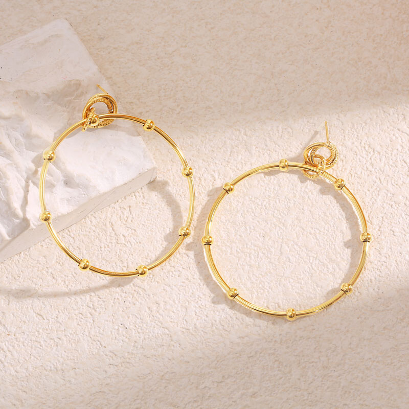 Wholesaler Eclat Paris - Golden hanging earrings Circle and structured balls