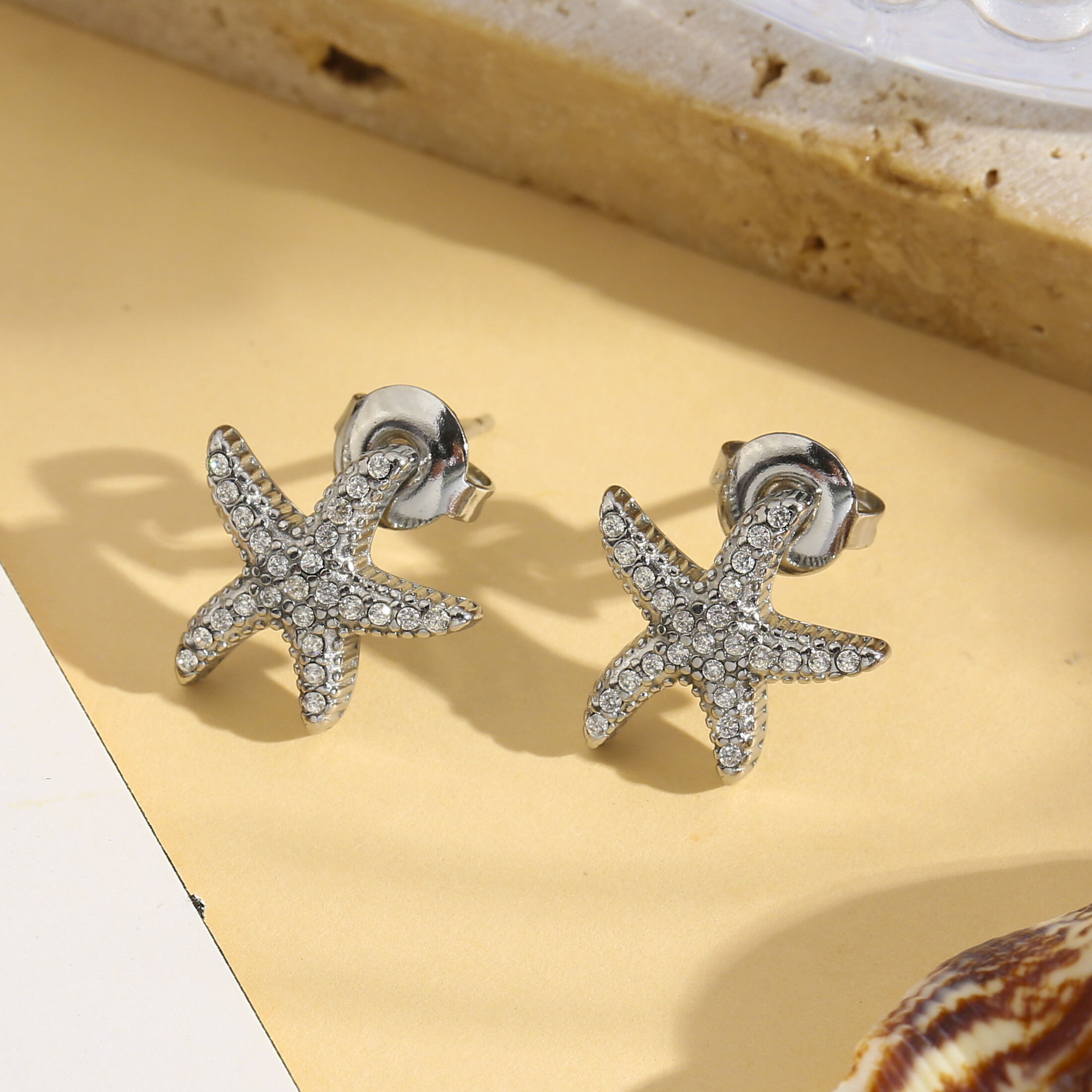 Grossiste Eclat Paris - Boucles d'oreilles étoile de mer scintillante