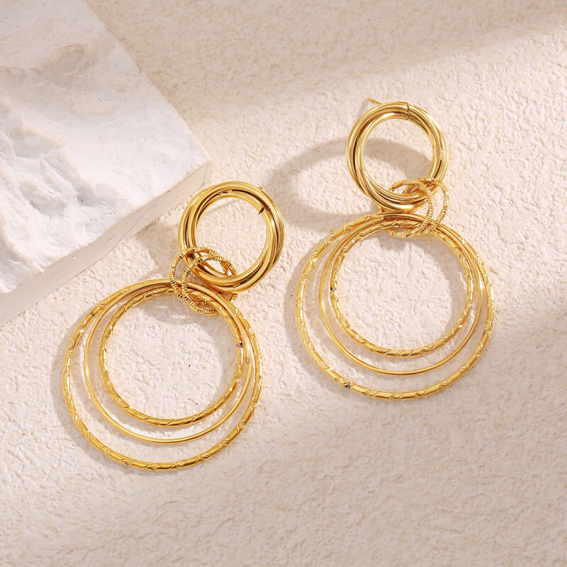 Wholesaler Eclat Paris - Goldly hanging earrings intertwined circles