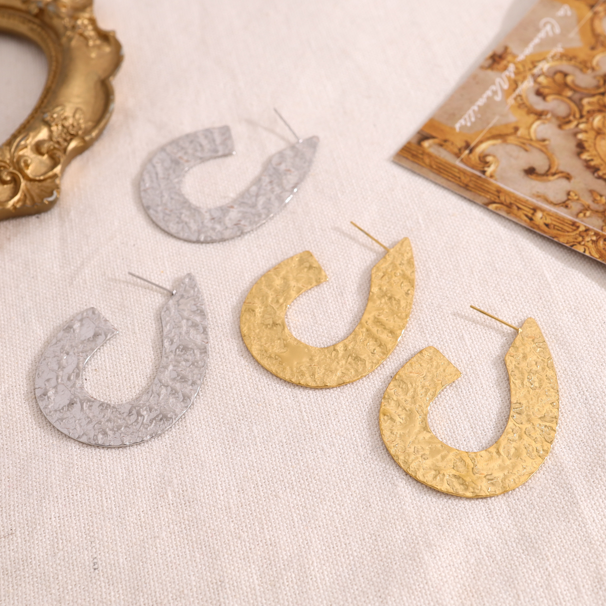 Wholesaler Eclat Paris - Oval hoop earrings in gold and silver with a flat, brushed, shiny finish