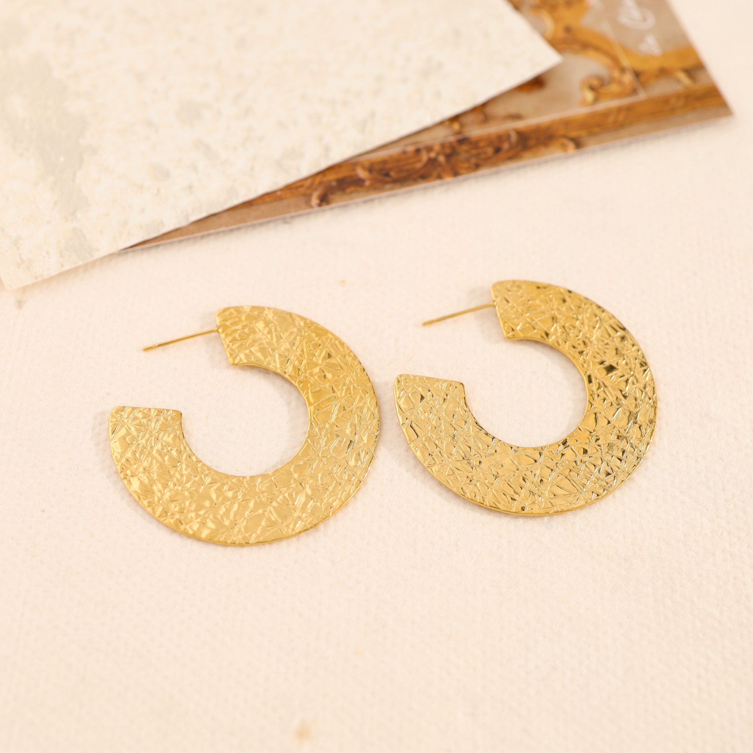Wholesaler Eclat Paris - Flat round gold hoop earrings with a shiny brushed effect