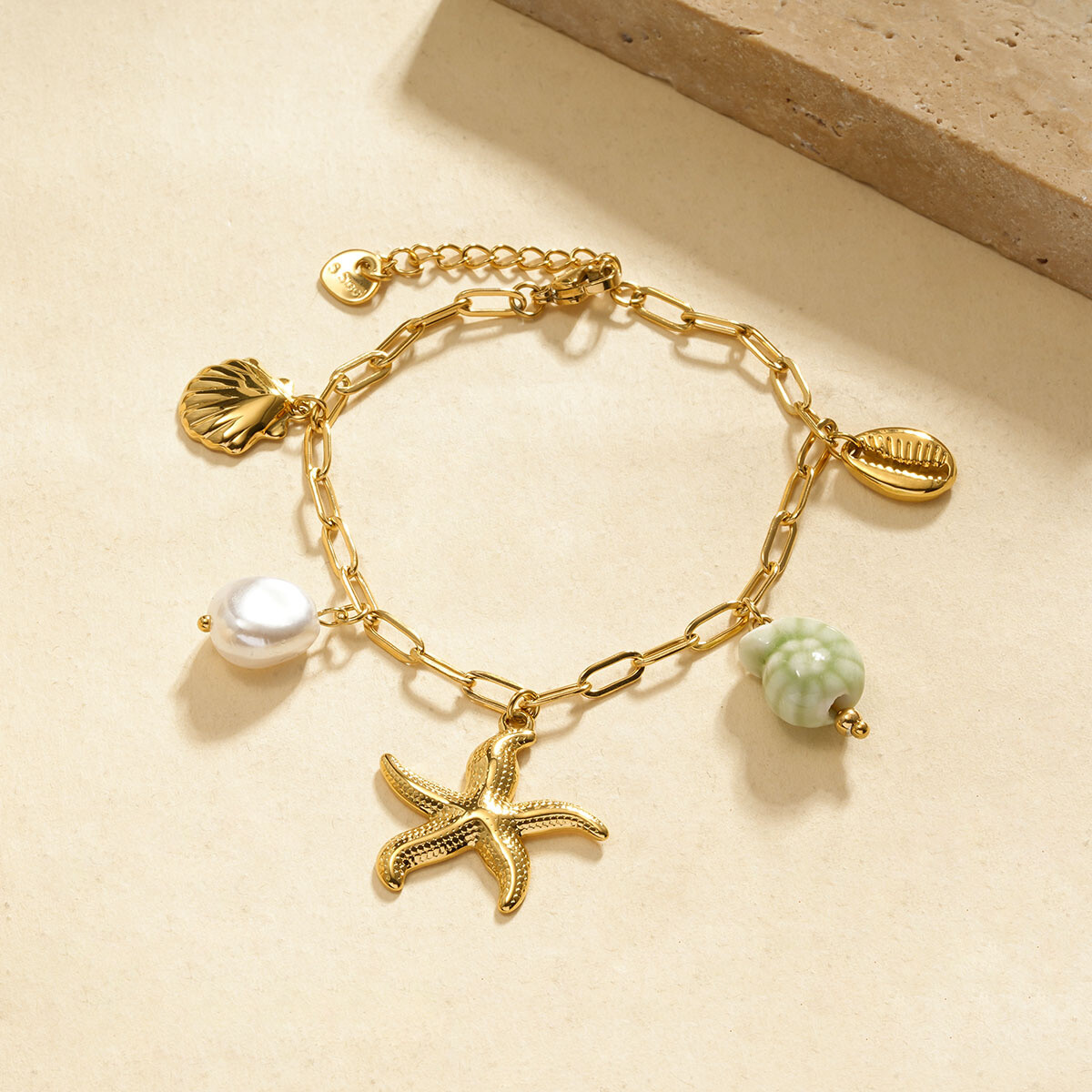 Wholesaler Eclat Paris - Gold chain bracelet with starfish and green seashell