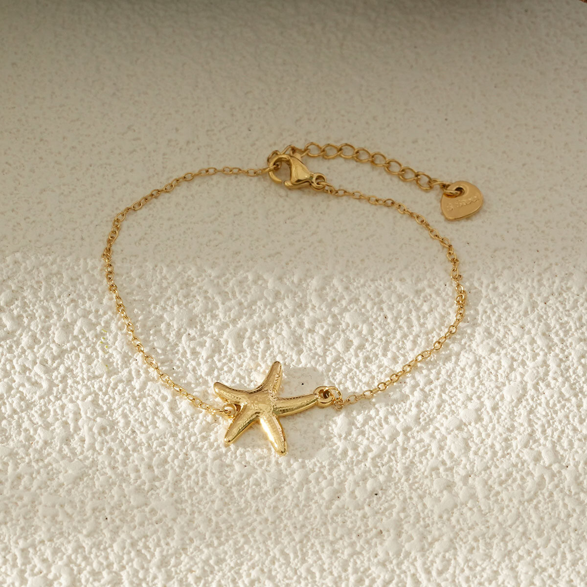 Grossiste Eclat Paris - Bracelet Chaîne Fine Dorée Charms Étoile Marine