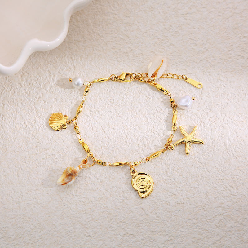 Wholesaler Eclat Paris - Golden chain bracelet ocean charms and pearls