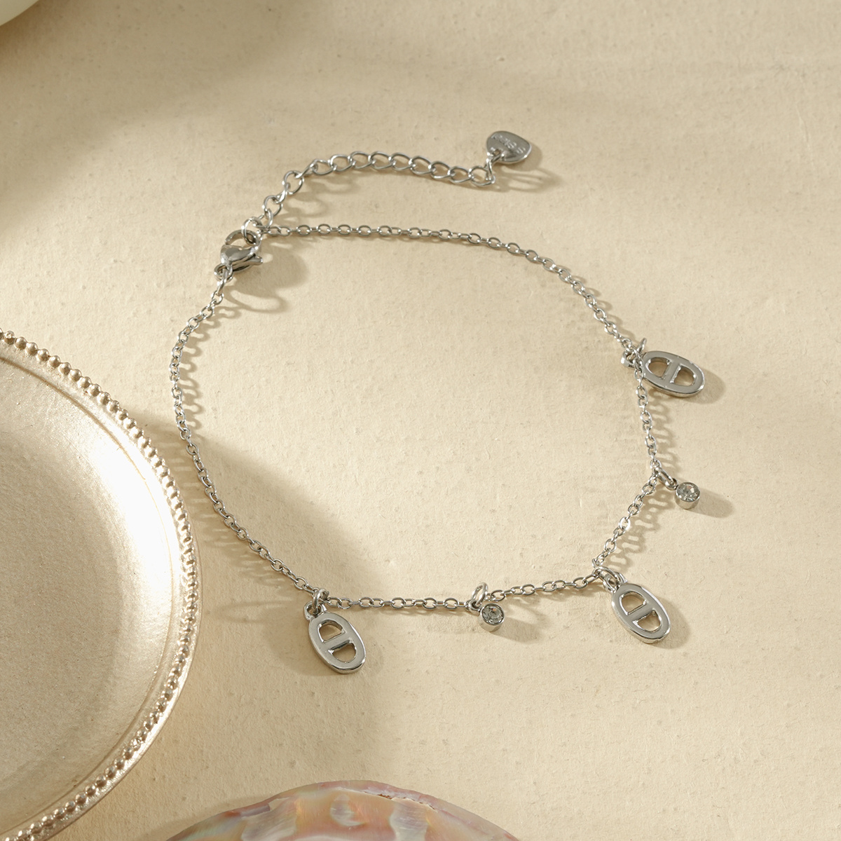 Wholesaler Eclat Paris - Silver anklet with shiny oval patterns
