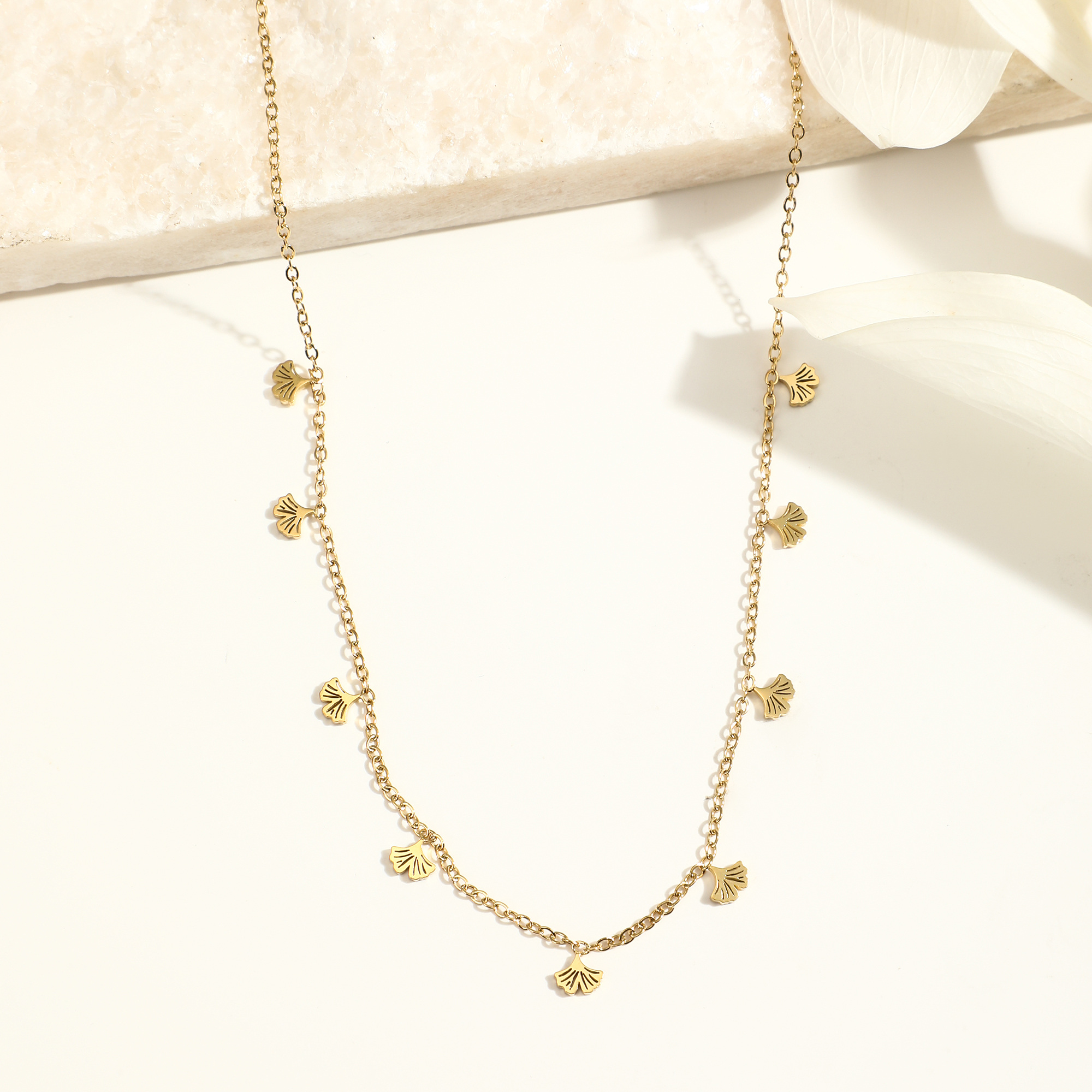 Wholesaler Eclat Paris - Gold necklace with 9 ginkgo flower pendants