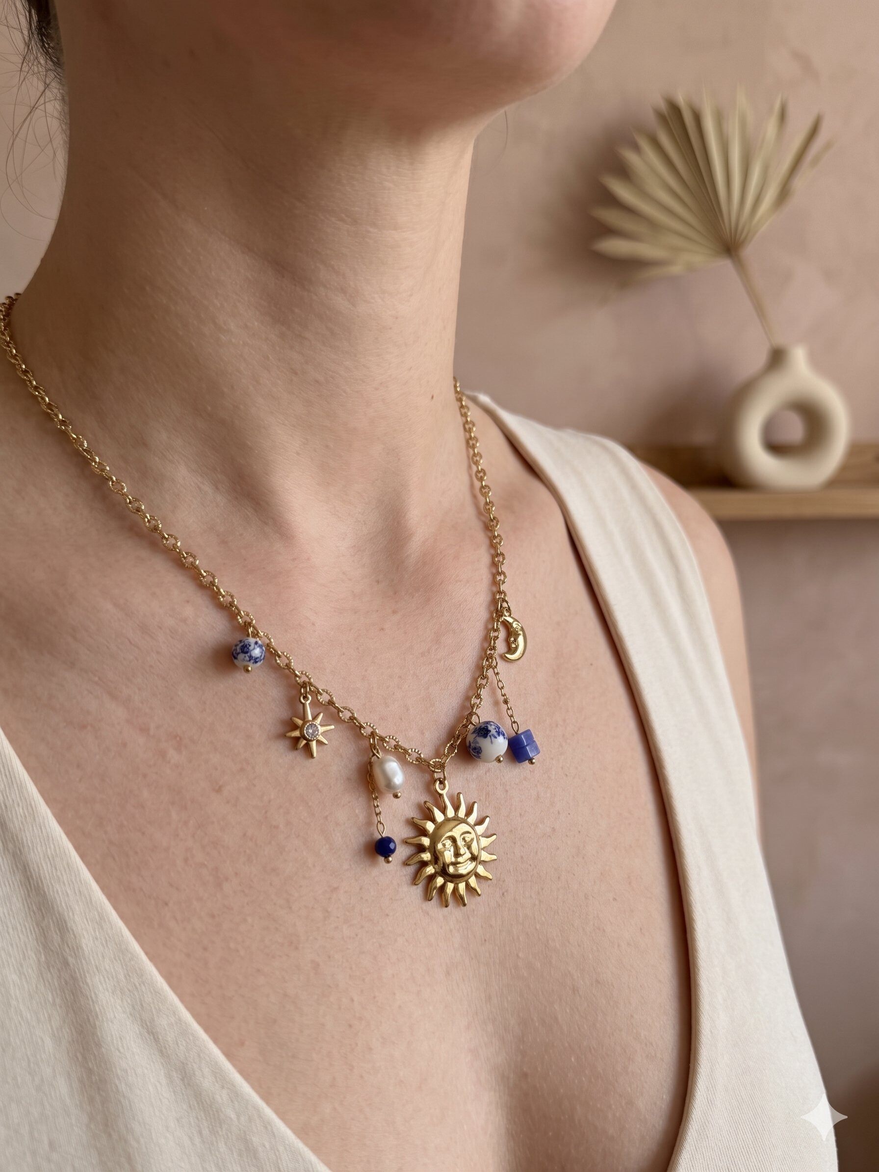 Grossista Eclat Paris - Collana dorata con astri celesti e perle blu
