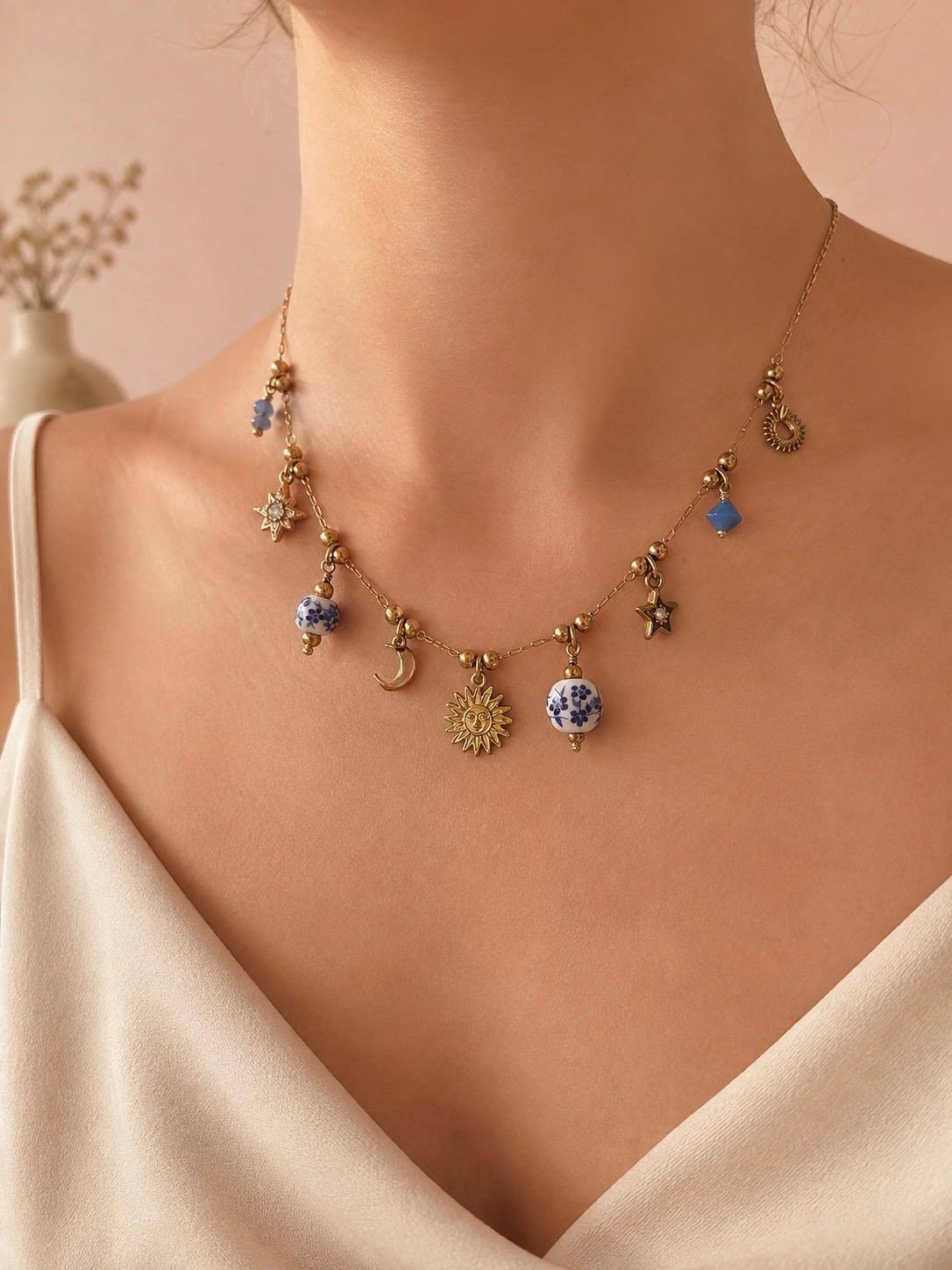 Grossiste Eclat Paris - Collier sautoir céleste doré chute longue