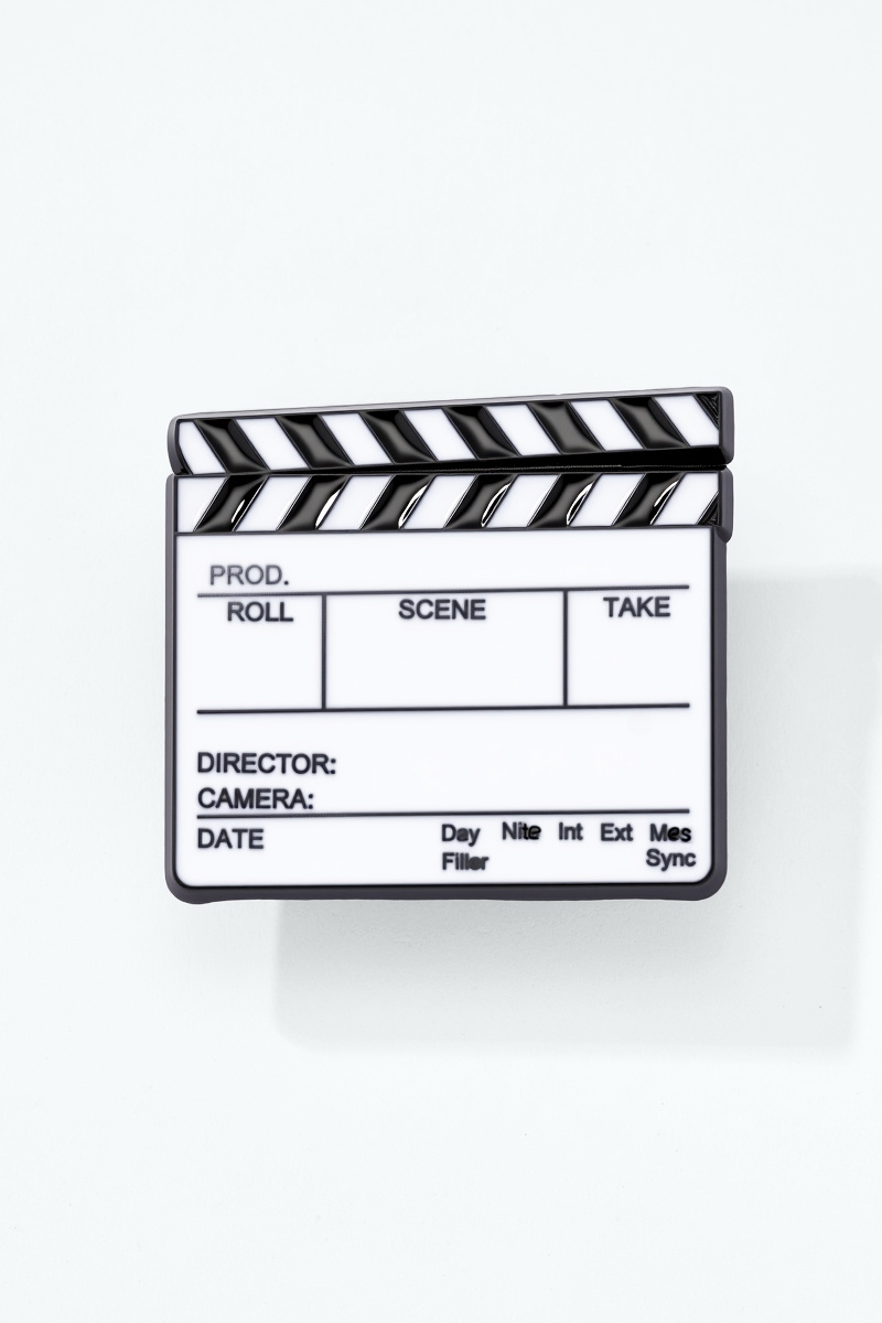 Grossiste ÉLINE L'ATELIER - Pin's en résine Clap de cinéma
