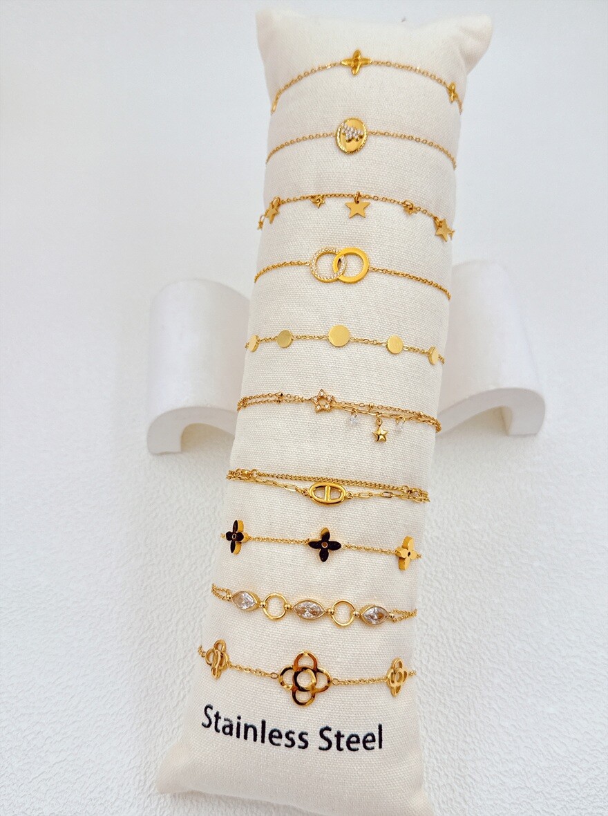 Grossiste Ella Ella - LOT DE 10 BRACELETS EN ACIER INOXYDABLE SUR COUSSIN