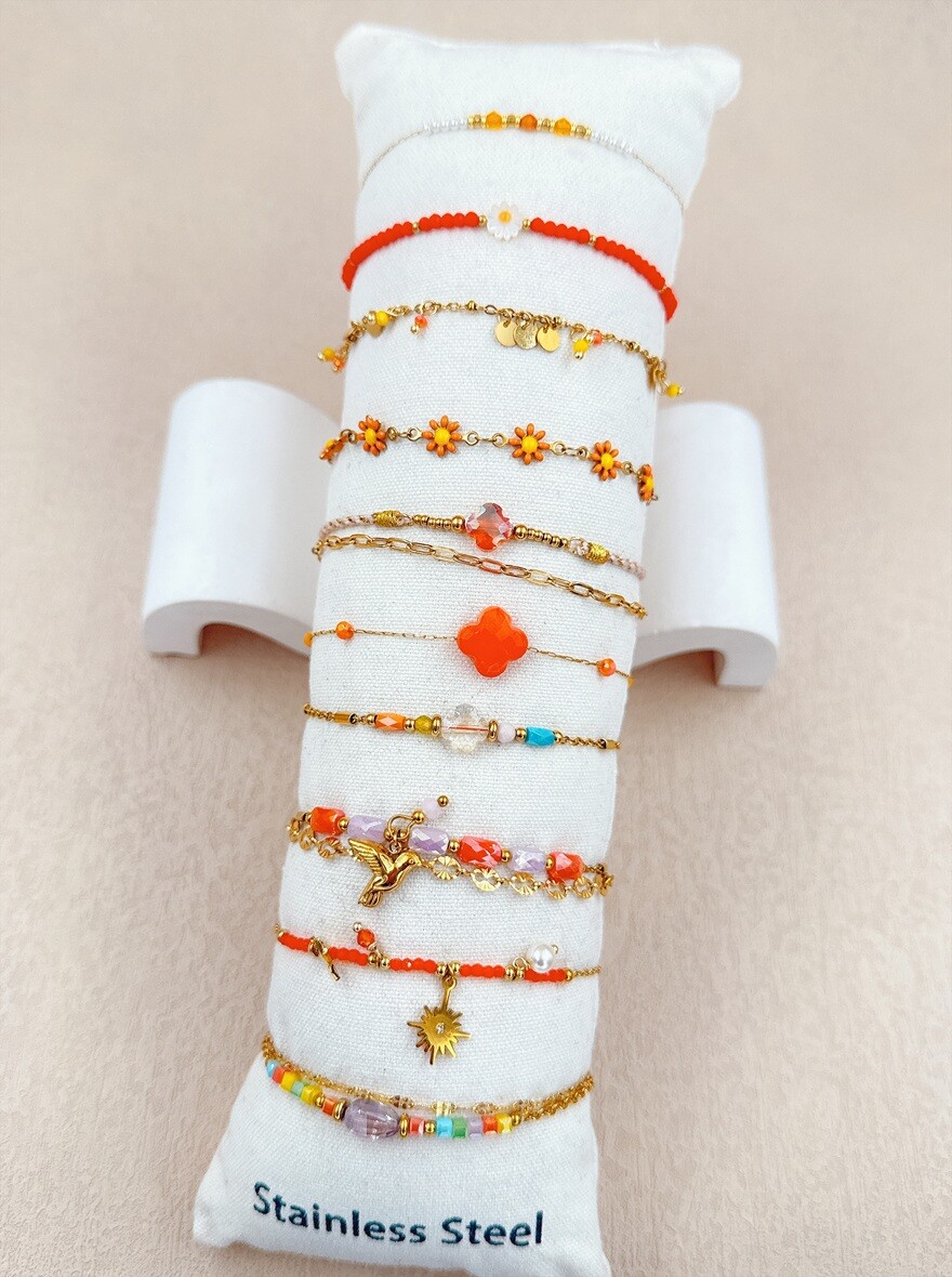 Grossista Ella Ella - SET DI 10 BRACCIALETTI IN ACCIAIO INOSSIDABILE SU CUSCINO
