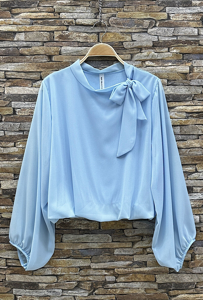 Grossista Elle Style - Blusa ANIELLA, stampata con romantiche maniche fluide, chic e alla moda con fodera in viscosa.
