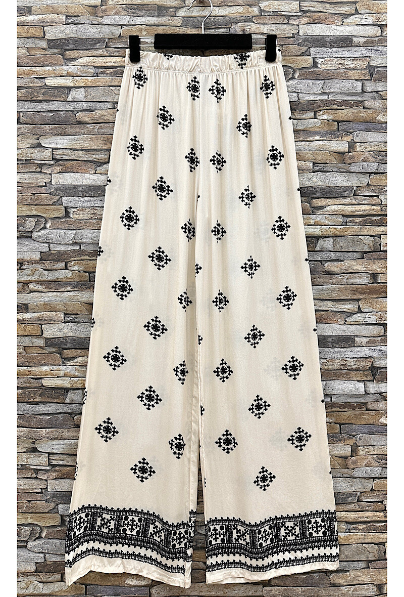 Grossista Elle Style - Pantaloni MELANIE larghi stampati, fluidi e romantici in viscosa
