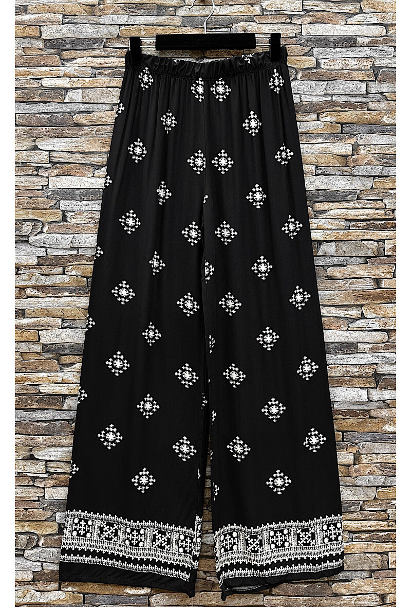 Grossista Elle Style - Pantaloni MELANIE larghi stampati, fluidi e romantici in viscosa