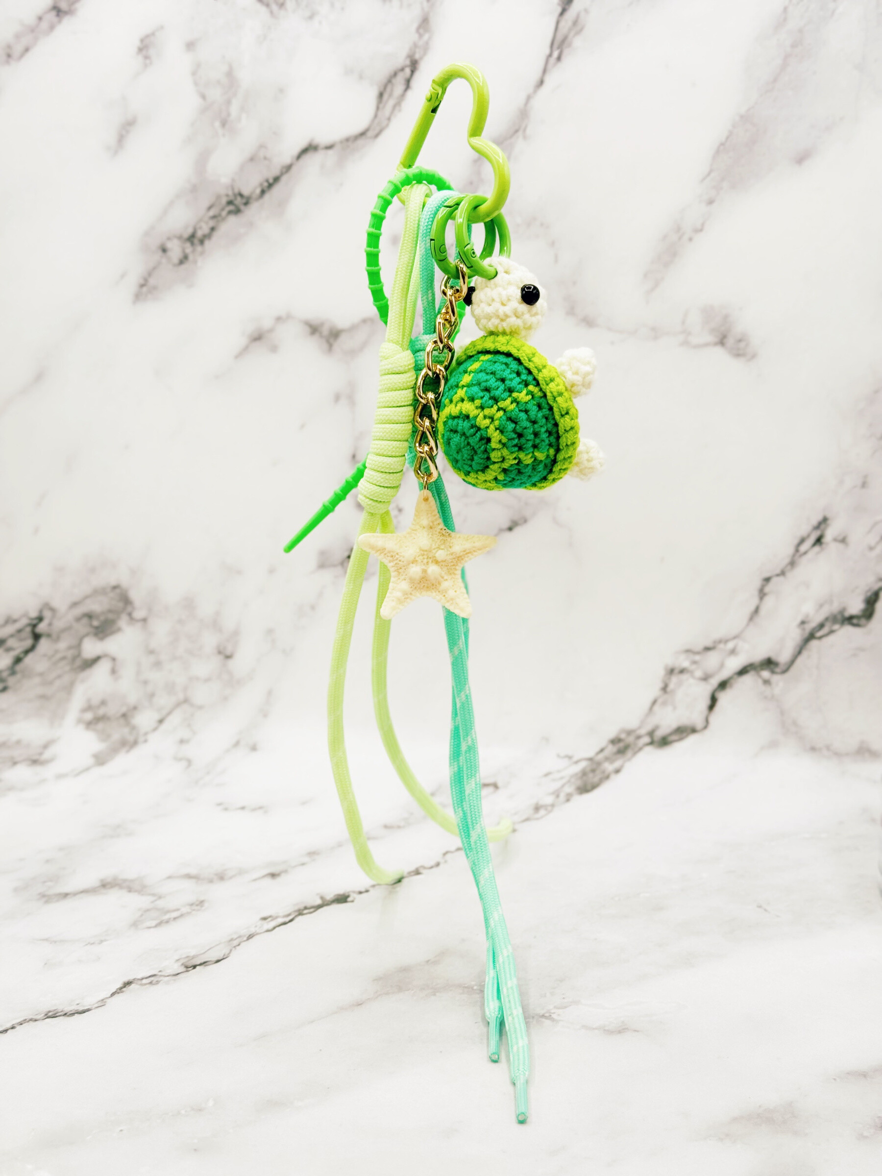 Grossiste Emily - Accessoire Sac/Porte Clés Couleur Tortue