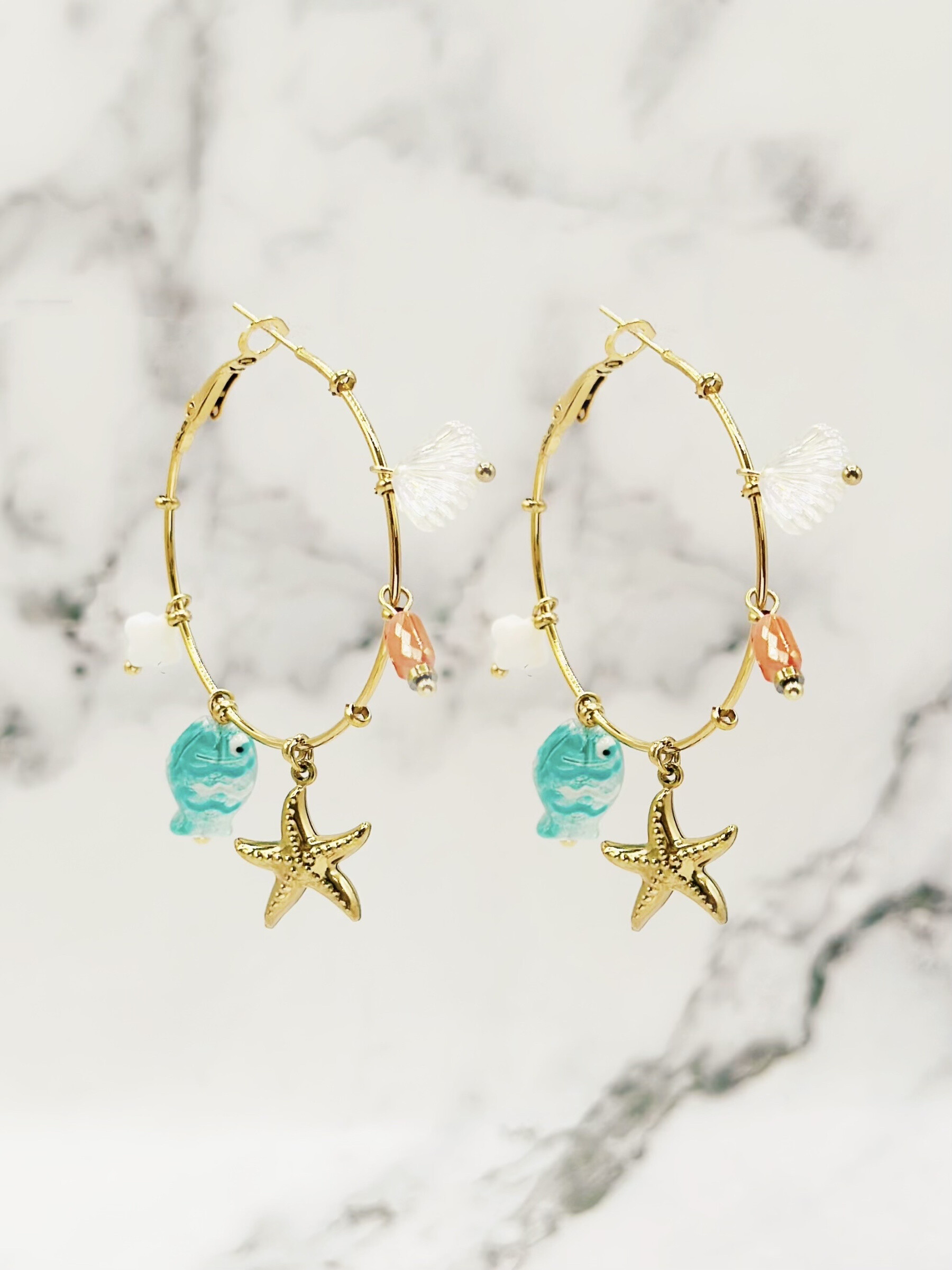 Mayorista Emily - Pendientes de acero con estrella de mar y perla blanca