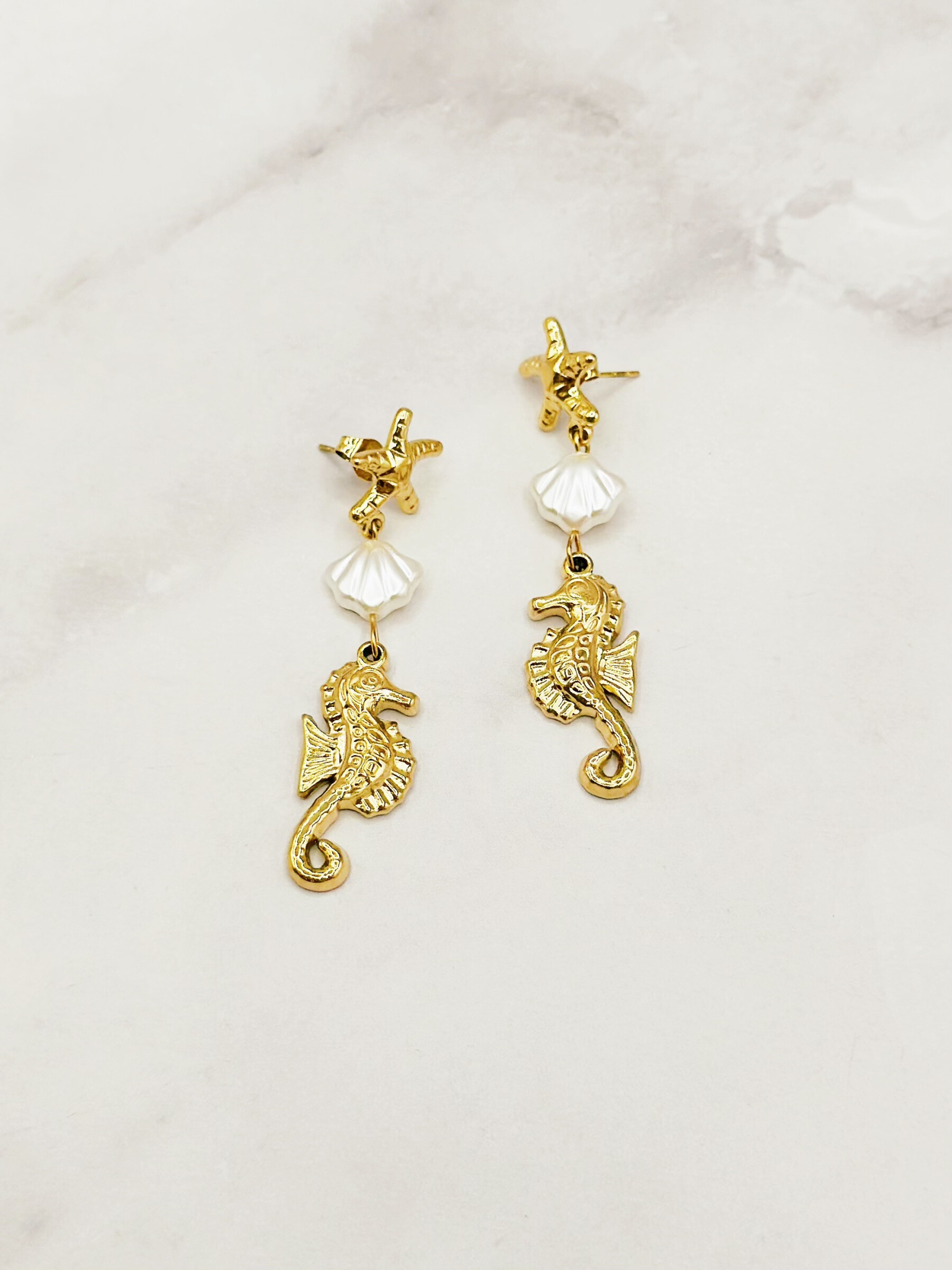Mayorista Emily - Pendientes de acero con estrella de mar y perla blanca