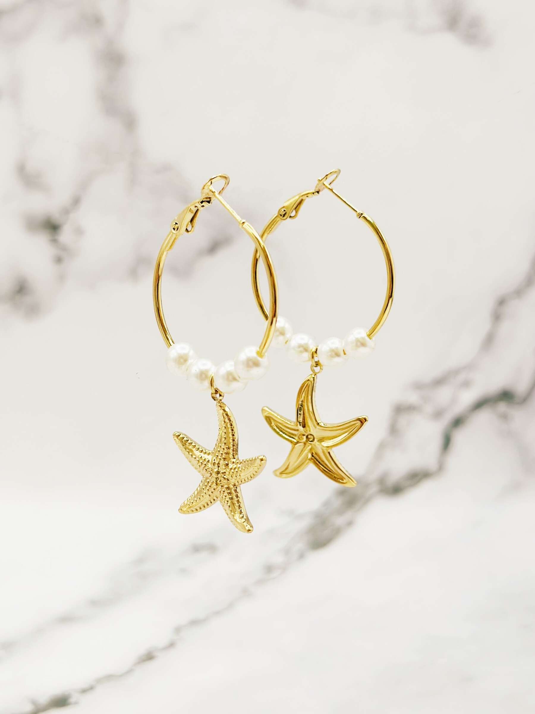 Grossiste Emily - Boucles d'oreilles en acier inoxydable Créoles Etoile de mer