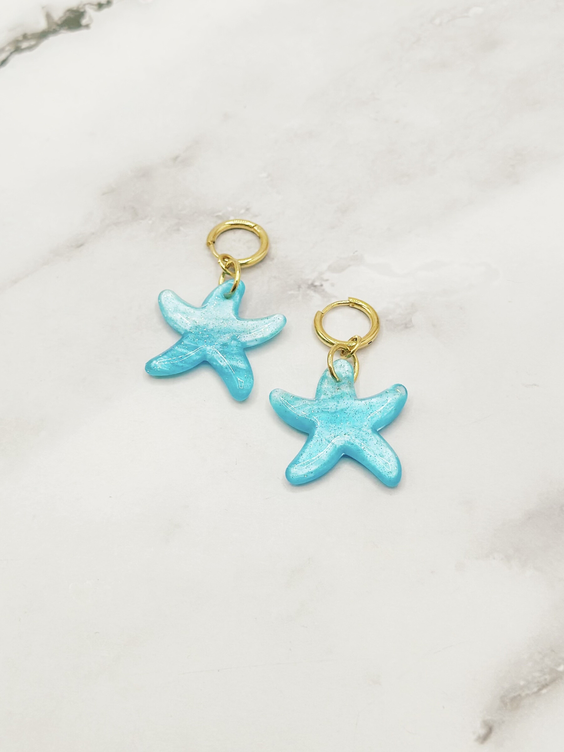 Grossiste Emily - Boucles d'oreilles en acier inoxydable Créoles Étoile de mer
