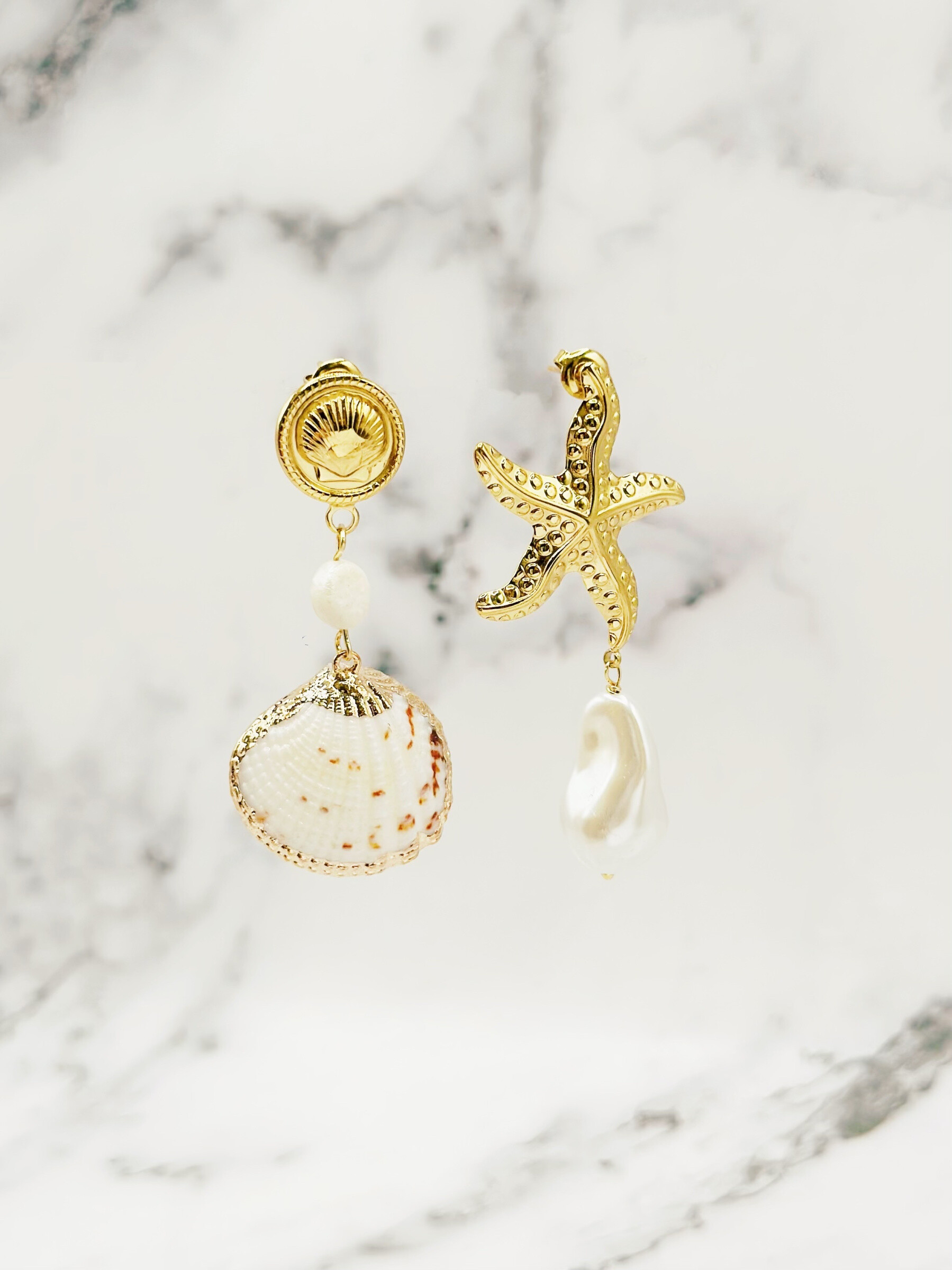 Mayorista Emily - Pendientes de acero con estrella de mar y perla blanca