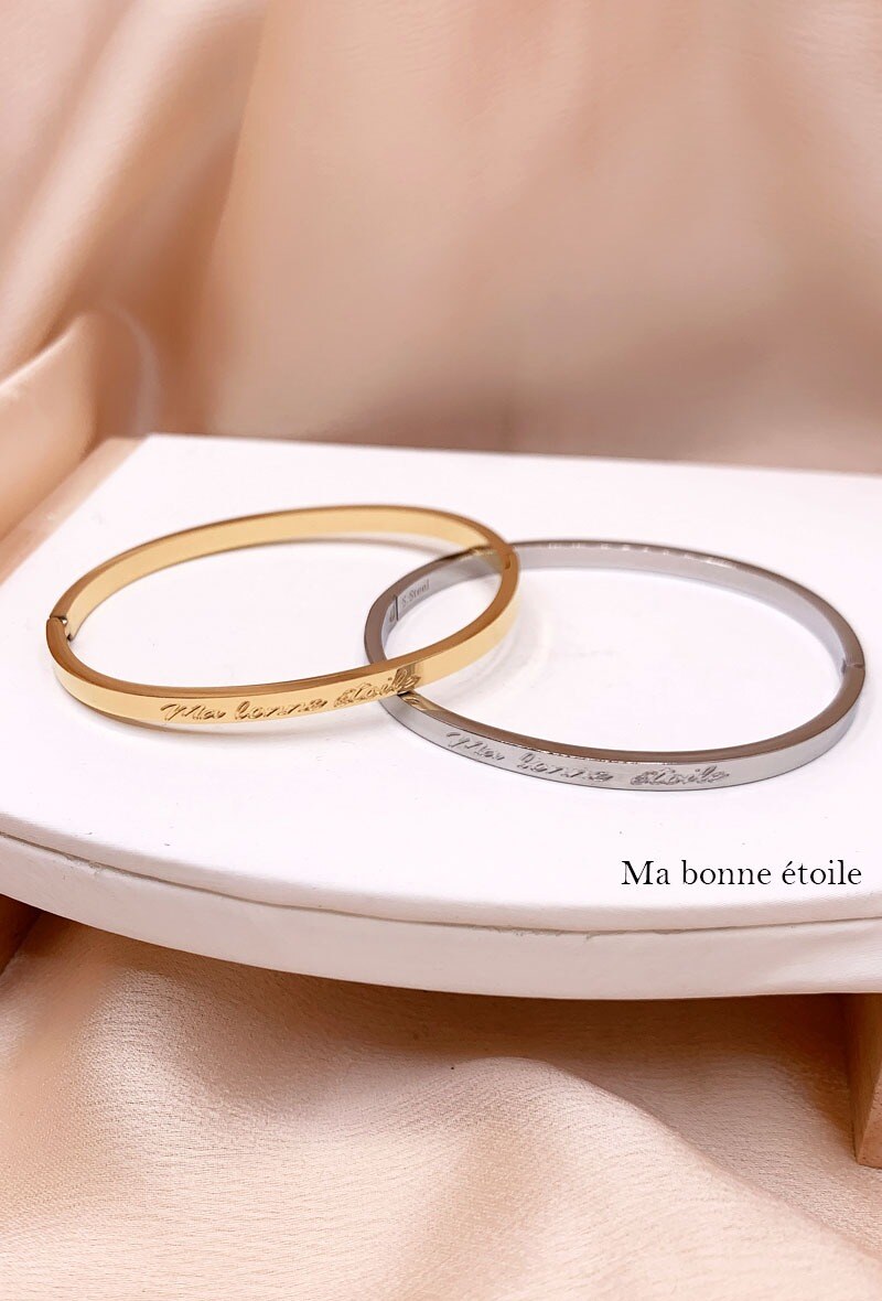 Wholesaler Emily - Closed steel bangle with engraved message My lucky star