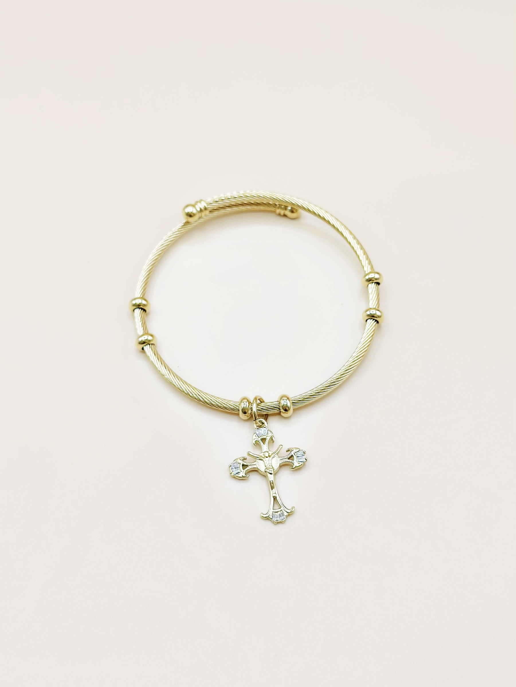 Grossiste Emily - Bracelet en acier inoxydable doré Croix