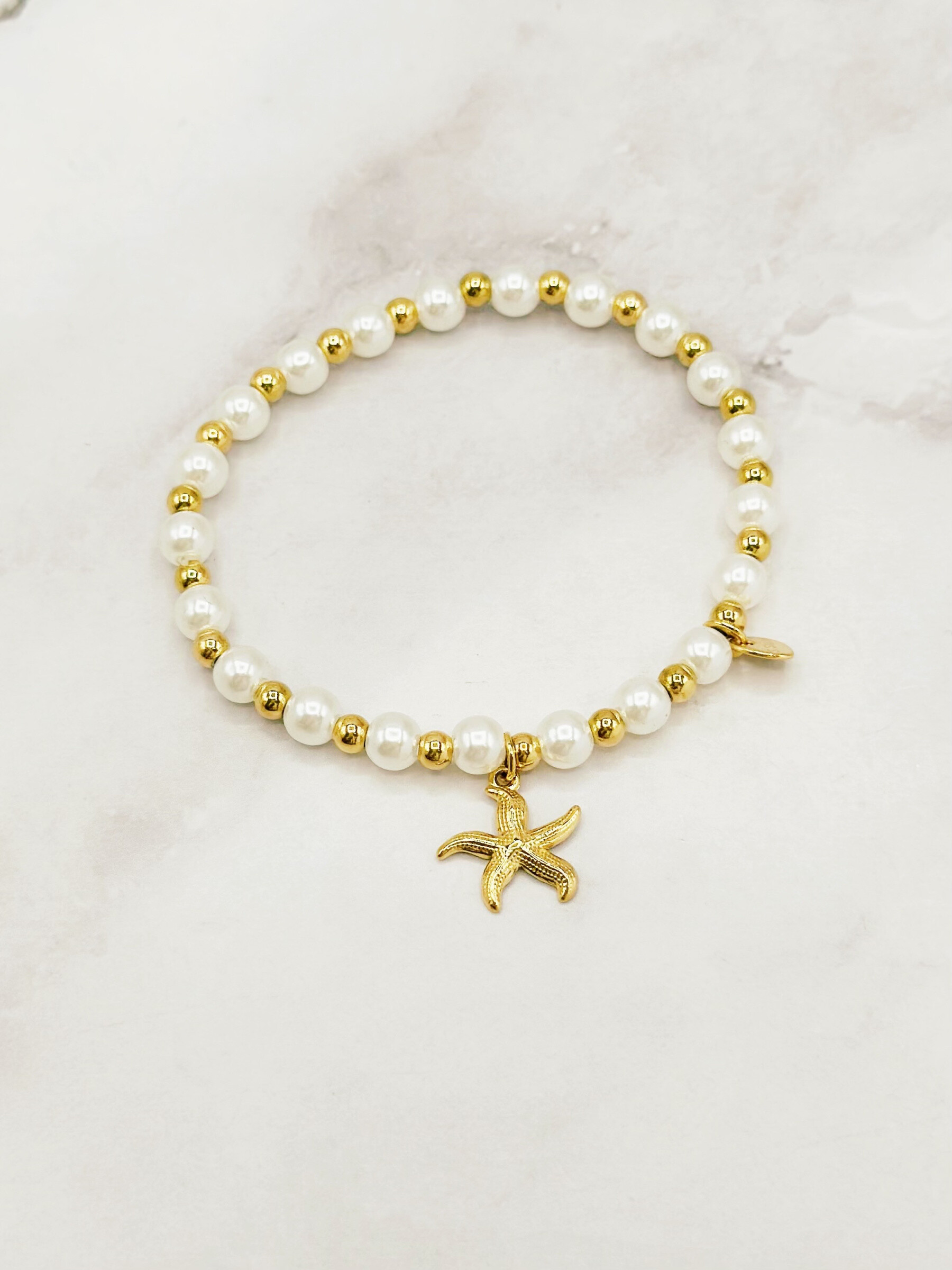 Grossista Emily - Bracciale in acciaio inossidabile regolabile con charms