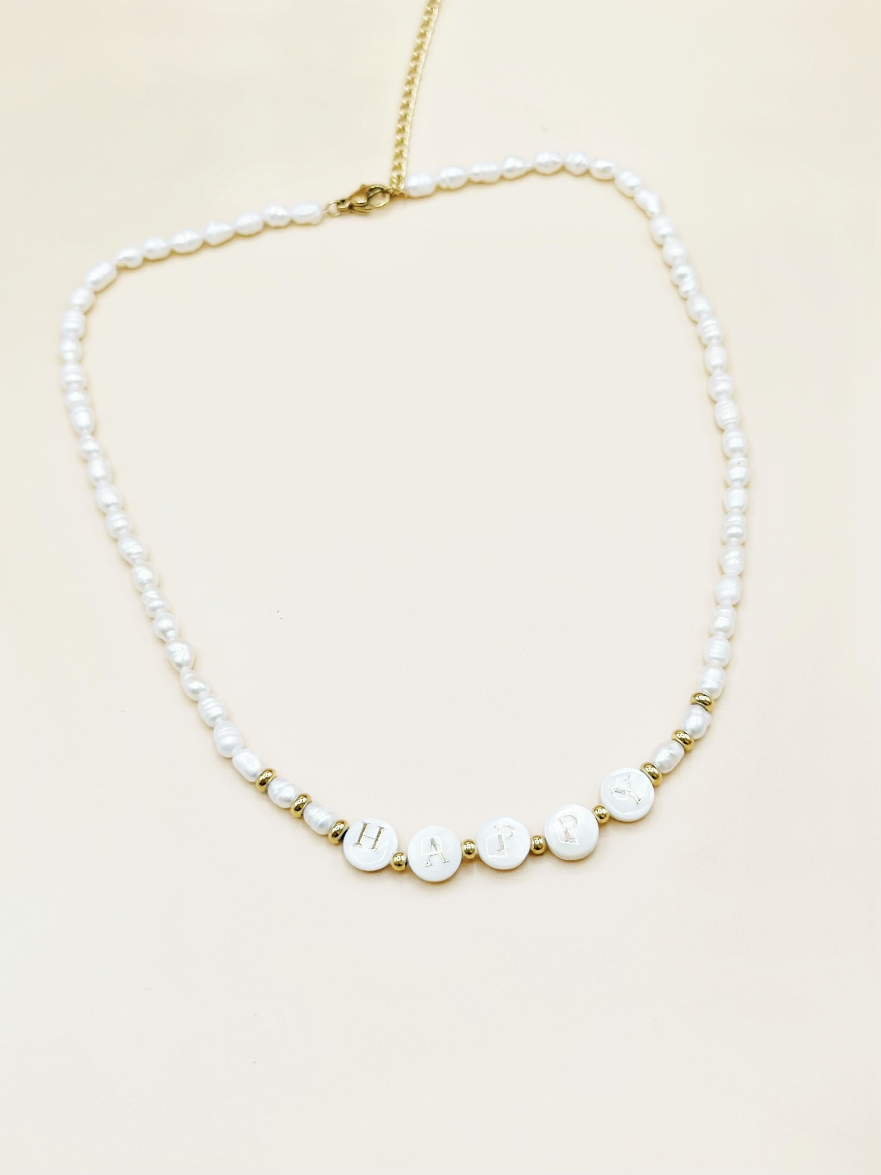 Mayorista Emily - Collar de acero inoxidable dorado con perlas de agua dulce HAPPY